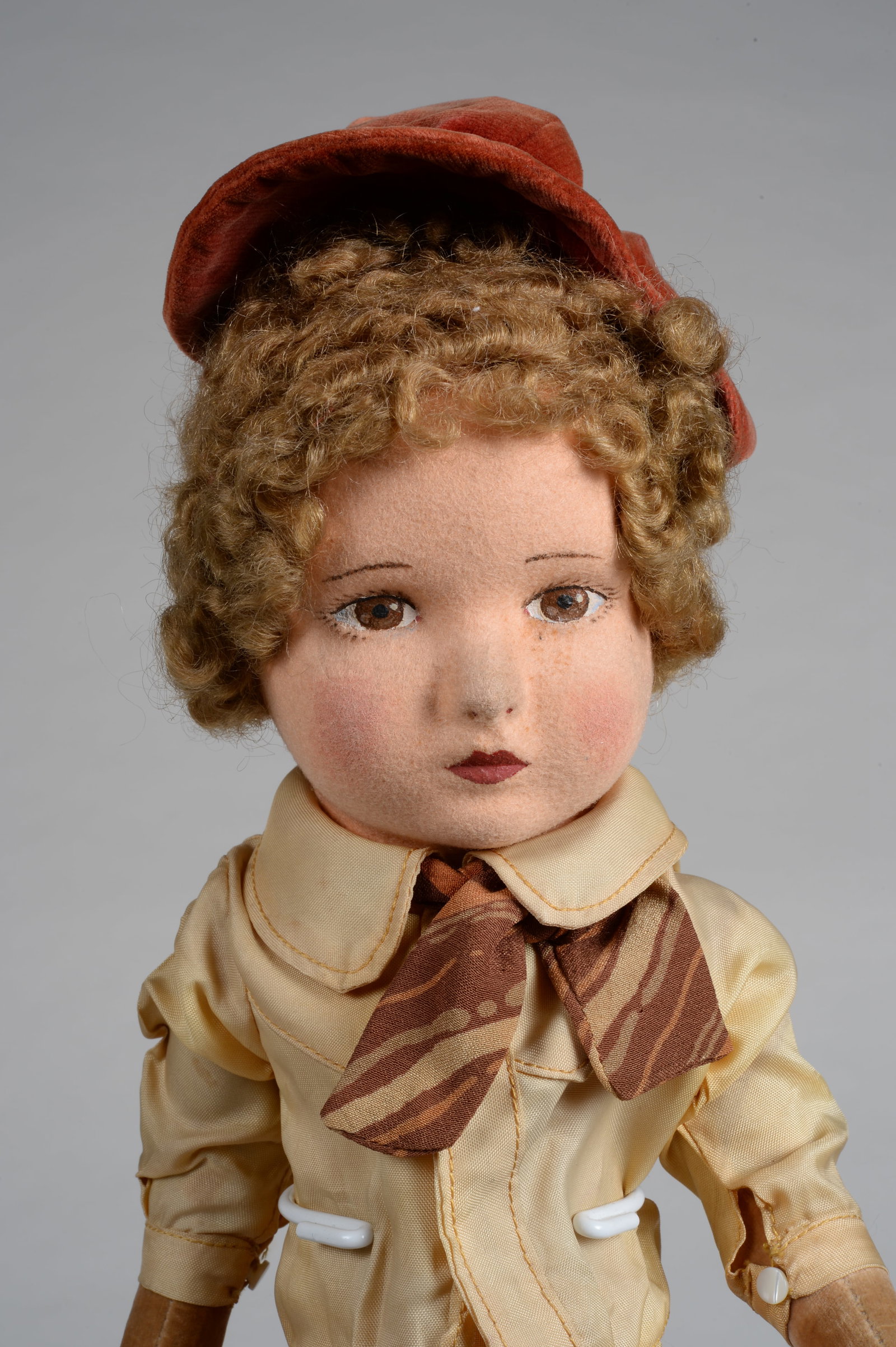 16.5 IN. CHAD VALLEY BOY:: ENGLAND, CIRCA 1930, FELT SWIVEL HEAD ON VELVETEEN BODY JOINTED AT SHOULDERS & HIPS, ORIGINAL BOY'S SUIT, BROWN MOHAIR CURLY WIG. OVERALL GOOD CONDITION, STAINING TO BODY