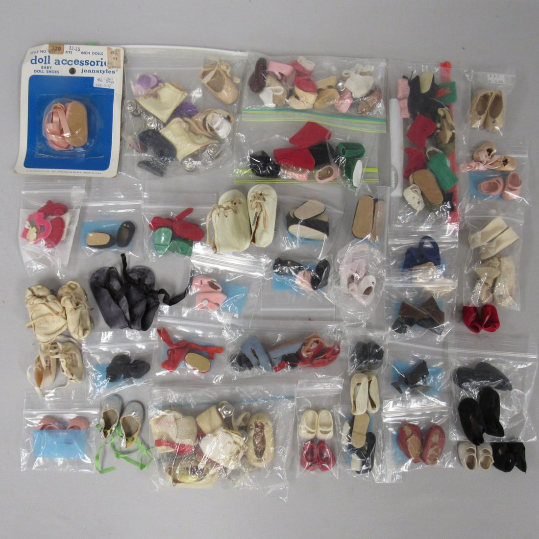 LARGE BOX LOT OF ASSORTED DOLL SHOES & SOCKS: (1 of 5)