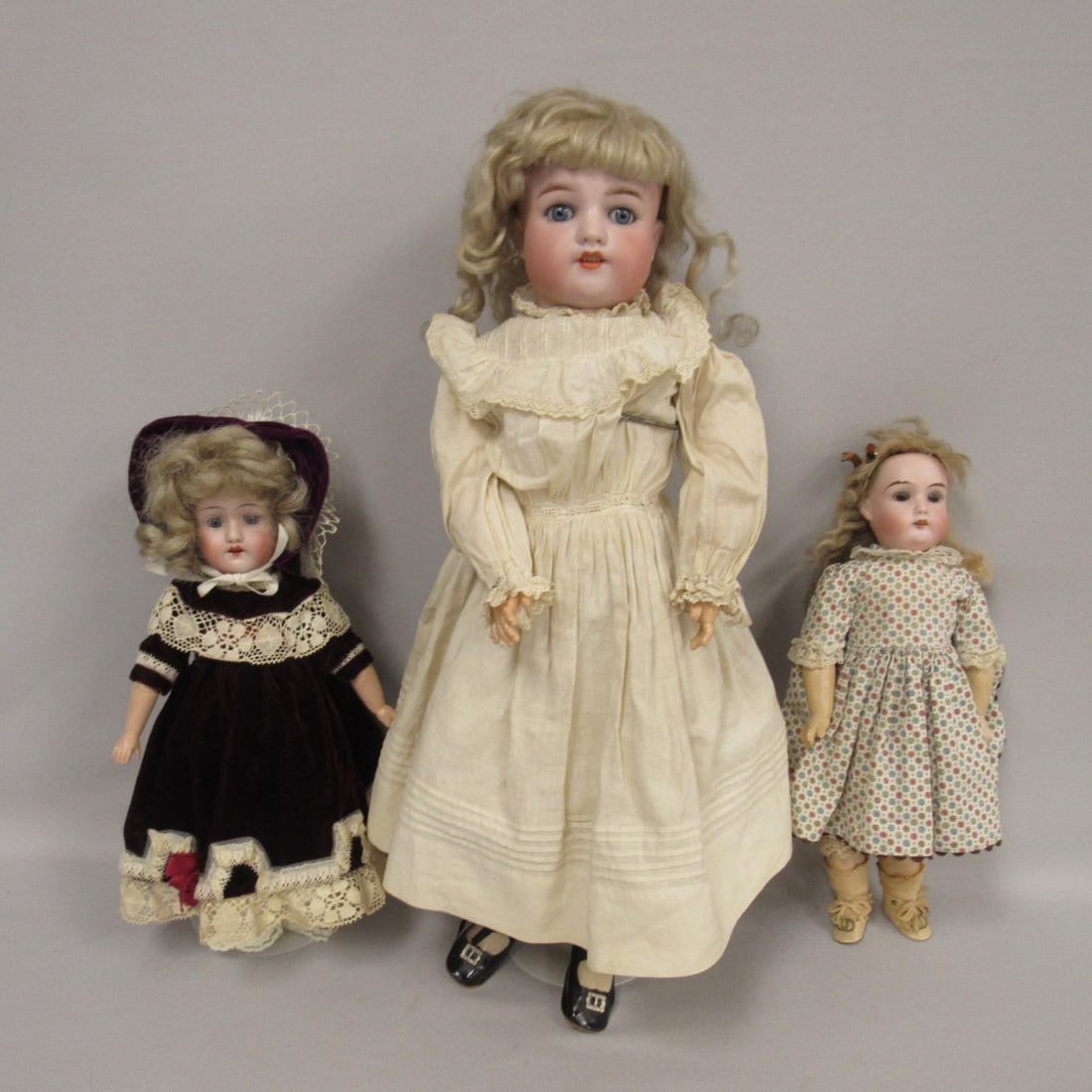LOT OF 3 BISQUE HEAD DOLLS:: 12 IN. MARKED WITH A W, SLEEP EYES, OPEN MOUTH WITH TEETH, NO DAMAGE, 14 IN. MARKED 2/5 MAJESTIC 310 GERMANY & 22 IN. MARKED 540 GERMANY SIMON & HALBIG S & H NO DAMAGE, SLEEP EYES, OPEN MOUTH WITH TEE