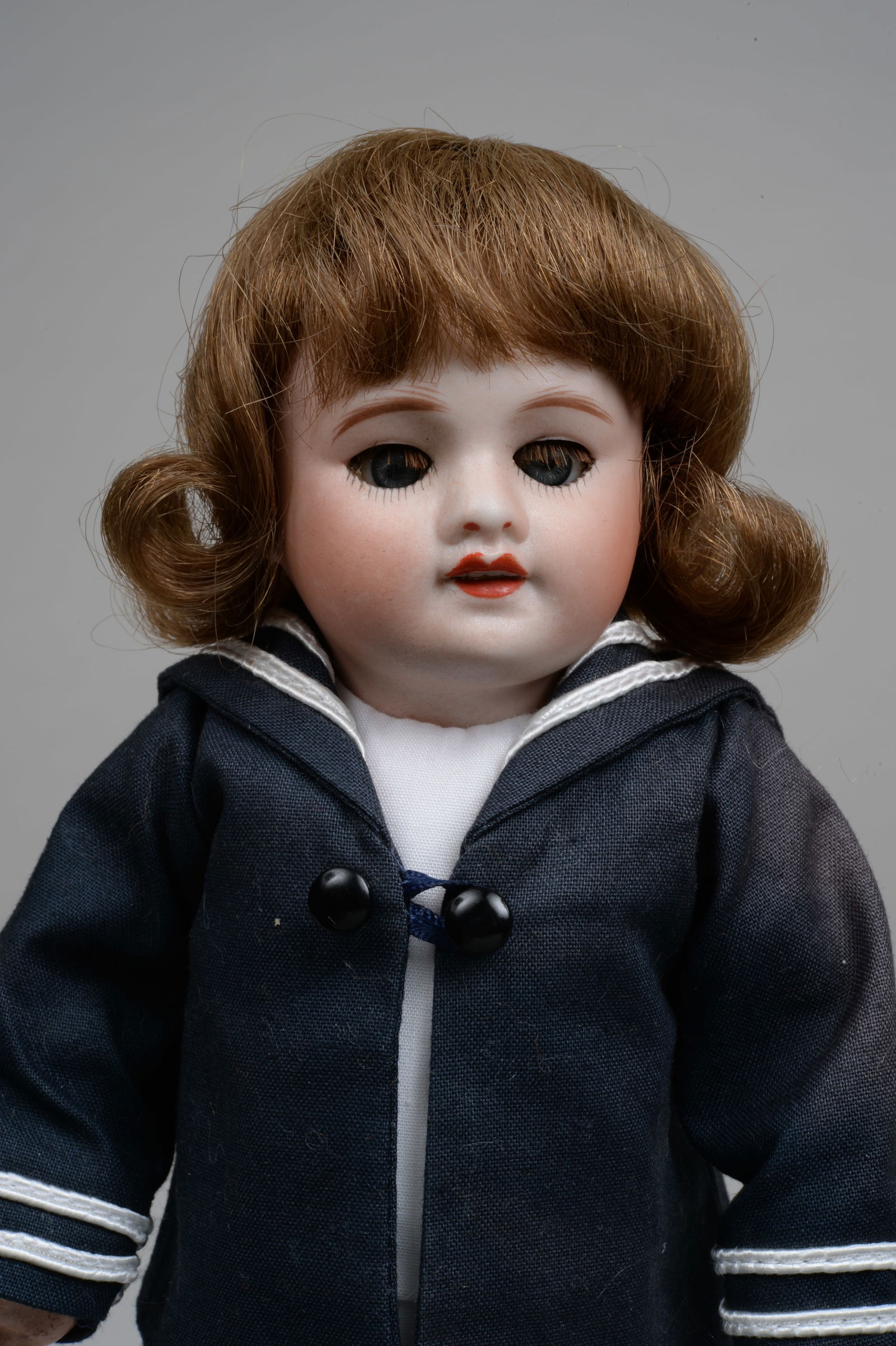 10 5/8 IN. UNIS FRANCE 60 BLEUETTE:: FRANCE, CIRCA 1920, PERFECT BISQUE SOCKET HEAD INCISED 71 UNIS FRANCE 149 60 8/0, MOLDED & PAINTED FEATURES WITH SLEEPING BLUE EYES WITH EYELASHES, BLUSHED CHEEKS OPEN MOUTH WITH FOUR TEETH, ON HER OR