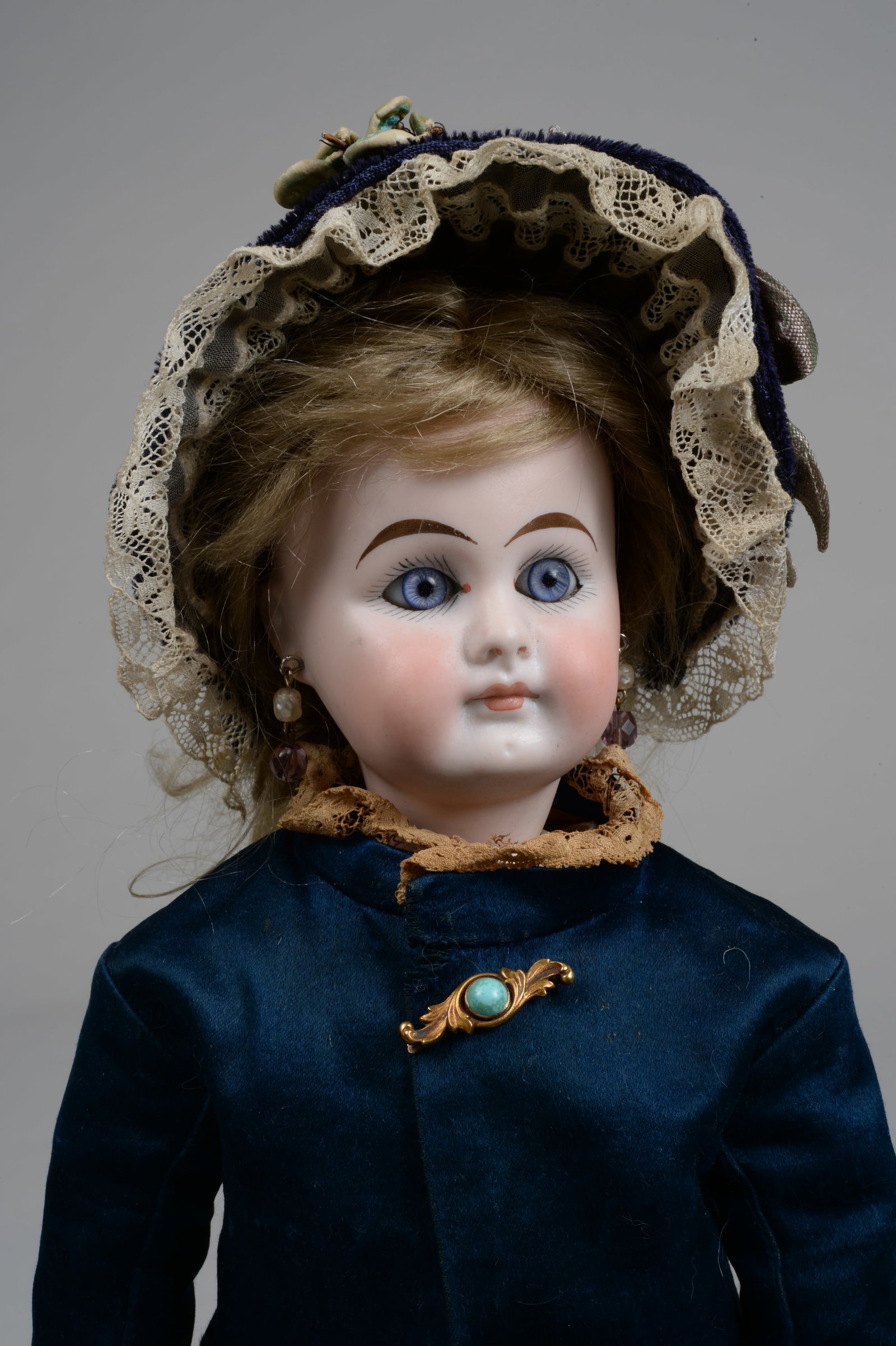14 IN. POUTY SONNEBERG BEBE:: GERMANY, CIRCA 1890, PERFECT BISQUE SOCKET HEAD INCISED 3, WITH PAINTED AND MOLDED FEATURES, BLUE THREADED STATIONERY GLASS EYES, ROSY CHEEKS, FULLY CLOSED MOUTH, PIERCED EARS, ON HER ORIGINAL COMPOSI