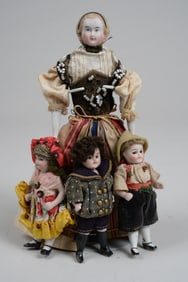 7.5 IN. MOTHER WITH 3 ALL BISQUE CHILDREN: