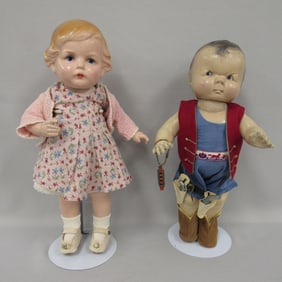 PAIR OF COMPOSITION DOLLS: