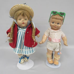 PAIR OF COMPOSITION DOLLS: