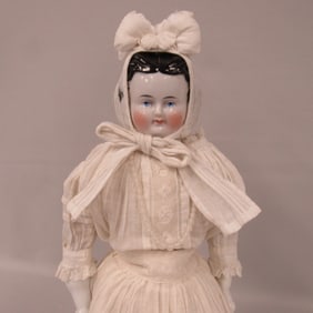 16 IN. CHINA HEAD WITH BRUSHED BACK HAIRSTYLE: