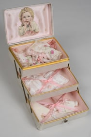 3.5 IN. ALL BISQUE BABY WITH BOXED LAYETTE: