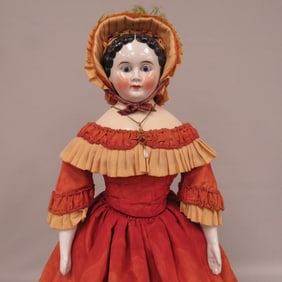 20 IN. CHINA HEAD WITH GLASS EYES: