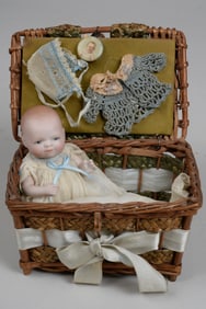 5 IN. GLASS-EYED BYE-LO BABY IN WICKER BASKET: