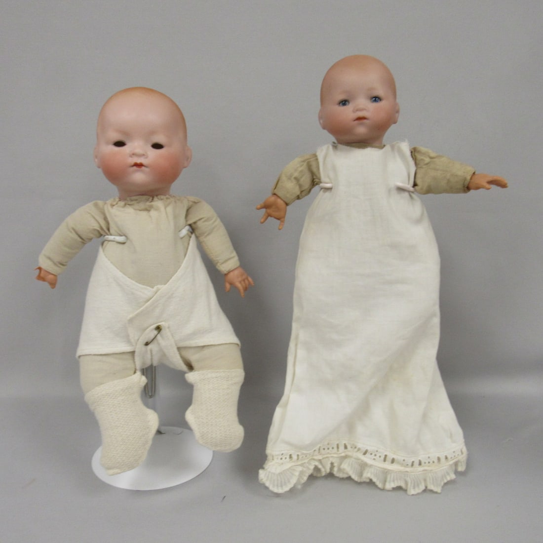 PAIR OF BISQUE HEAD BABY DOLLS: (1 of 15)