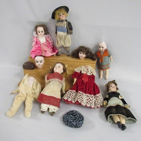 BOX LOT OF 7 SMALL BISQUE HEAD DOLLS: