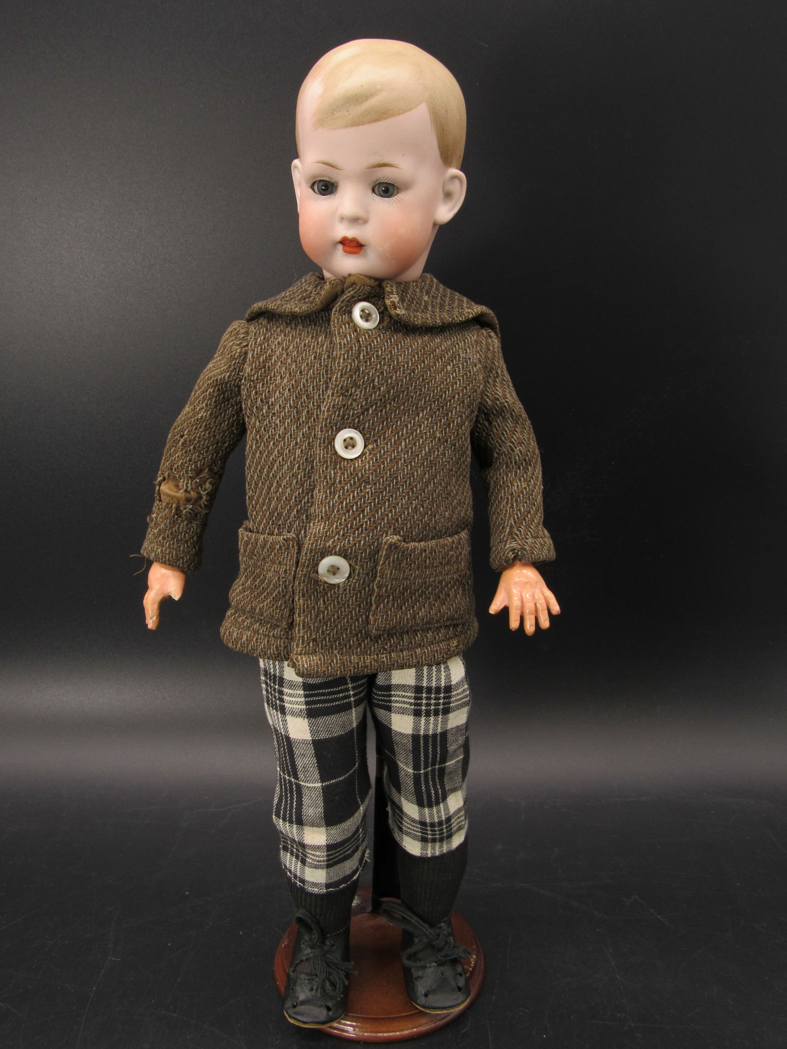 17 IN. "TOMMY TUCKER" BY BRUNO SCHMIDT CIRCA 1912:: MARKED 2048.2 SOLID DOME, PAINTED HAIR BISQUE HEAD, SLEEP EYES, OPEN MOUTH WITH TEETH & TONGUE. LIGHTWEIGHT COMPO BODY WITH PLAY WEAR AT JOINTS, CHIP ON RIGHT THUMB & FOREFINGER - G