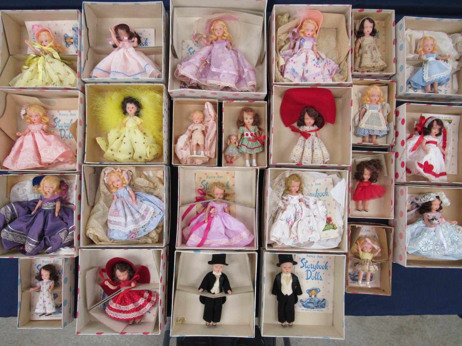 N. ANN STORYBOOK DOLLS & (1) HOLLYWOOD DOLL:: EACH ARE HARD PLASTIC & EACH ARE IN ORIGINAL BOX. 16 N. ANN DOLLS HAVE A BOOKLET & 7 DO NOT. HOLLYWOOD DOLL HAS A BOOKLET. MISSING WAIST TAGS. EACH DOLL IS VG/EX OR BETTER. MOST BOXES WITH LIGHT WEAR,