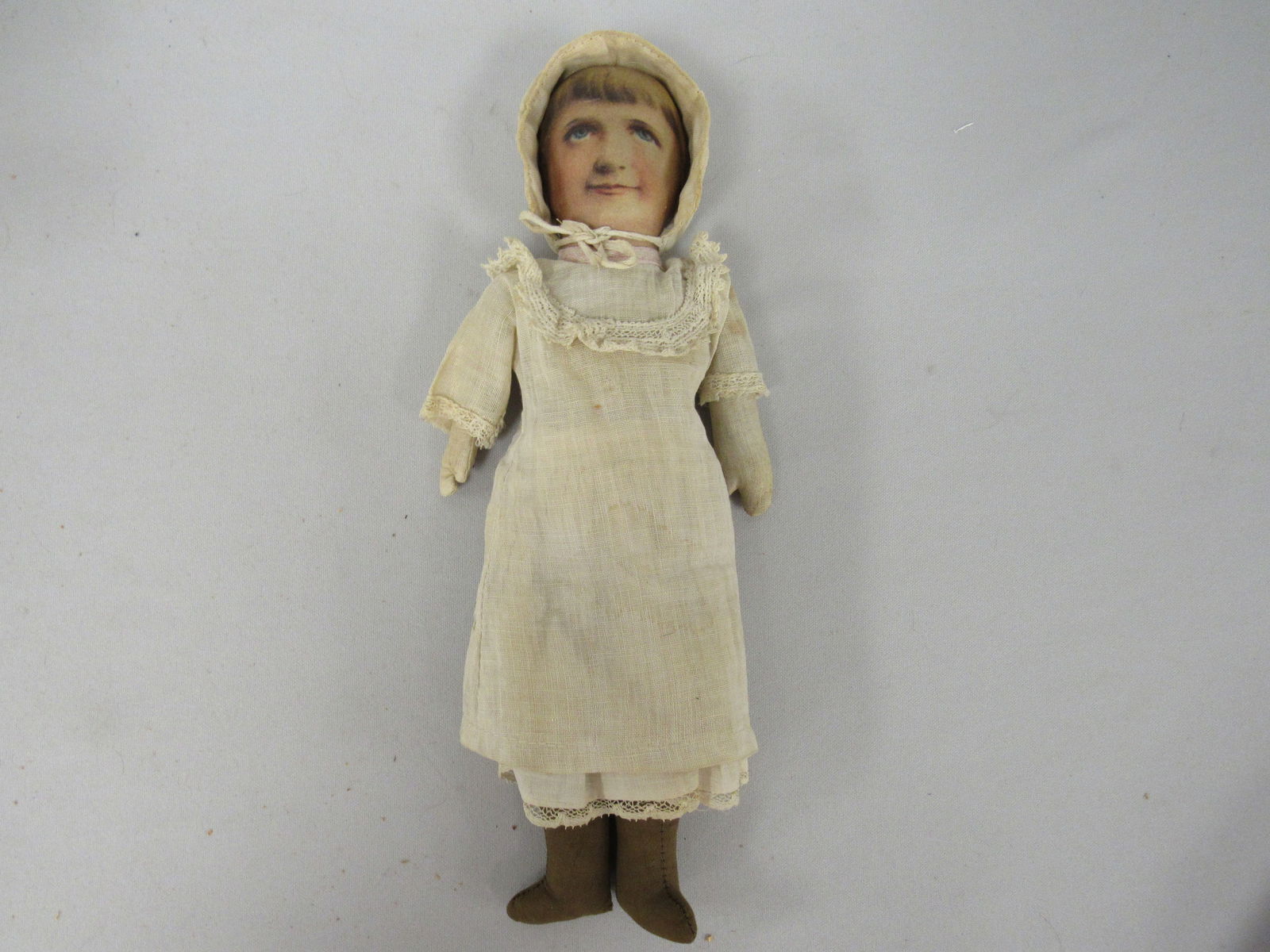 13 IN. BABYLAND RAG DOLL:: VERY NICE CONDITION INCLUDING LITHOGRAPH FACE, BONNET, ETC. CIRCA EARLY 1900'S. INCLUDES 12 CONFERENCE SEPT. 15-17, 1994 (FLINT, MICHIGAN)