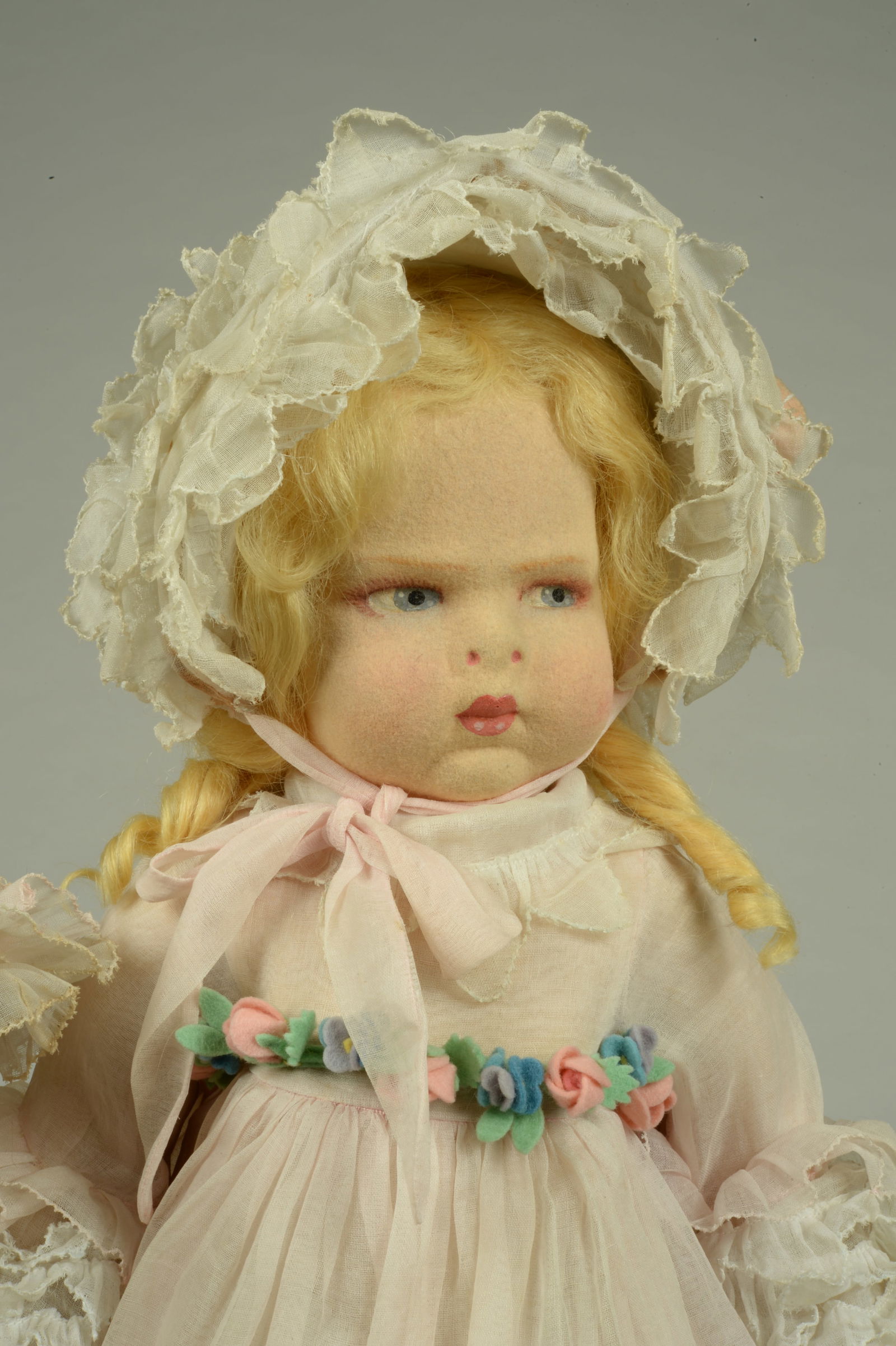 ORIG. 18 IN. 1500 POUTY CHILD "LITTLE MUFFET:: LENCI, ITALY, CIRCA 1935, MOLDED & PAINTED FELT HEAD WITH PAINTED FEATURES INCLUDING SIDE GLANCING BLUE EYES, BLUSHED CHEEKS, CLOSED POUTY MOUTH, BLONDE MOHAIR WIG, PINK ORGANDY RUFFLED TRIMMED