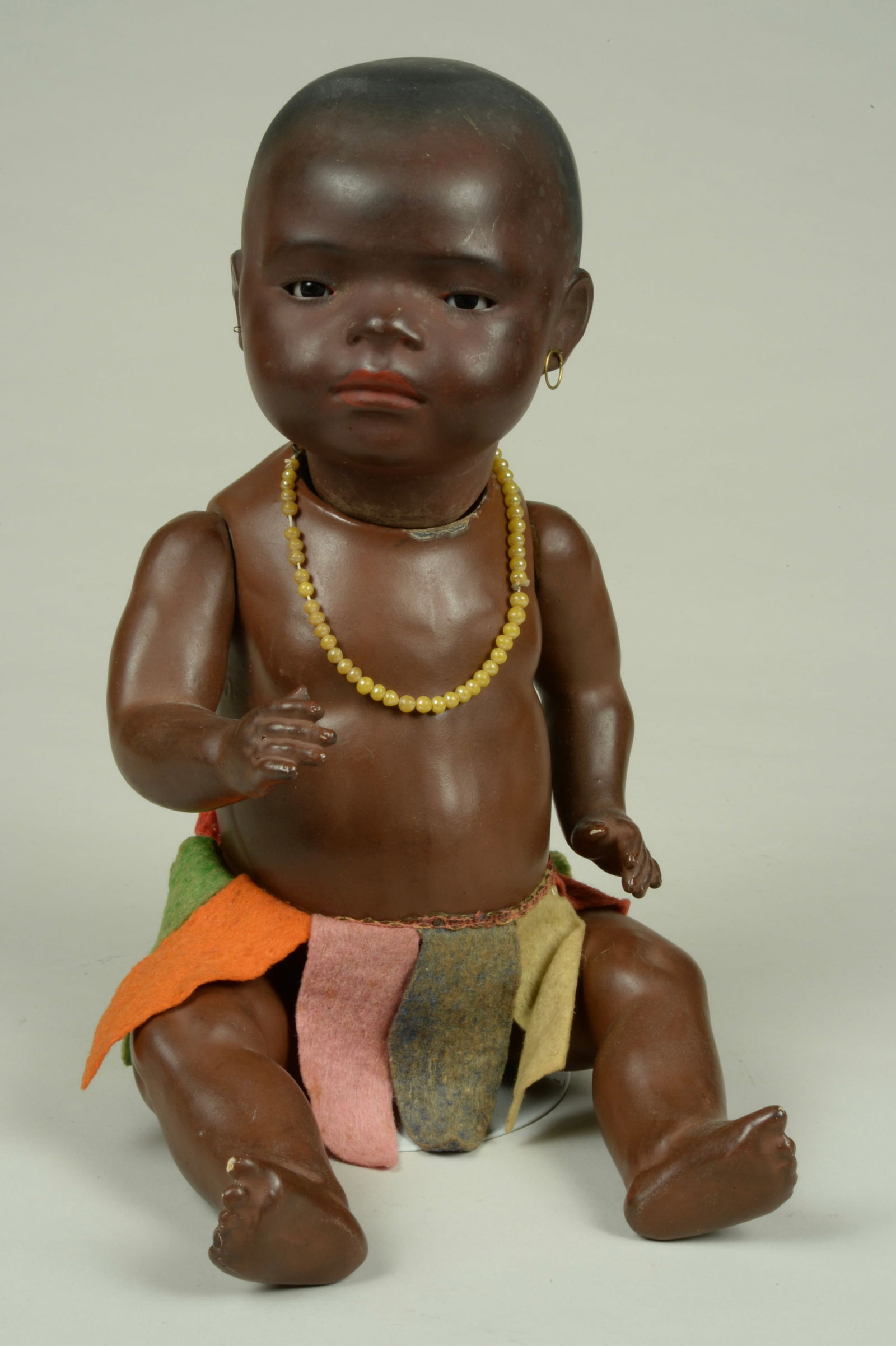 16 IN. HEUBACH KOPPELSDORF BLACK CHARACTER BABY:: GERMANY, CIRCA 1925, BROWN BISQUE SOCKET HEAD INCISED HEUBACH KOPPELSDORF 399 2/0 GERMANY, MOLDED & PAINTED FEATURES WITH BROWN GLASS SLEEPING EYES, PIERCED EARS, & A POUTY CLOSED MOUTH, OH HIS