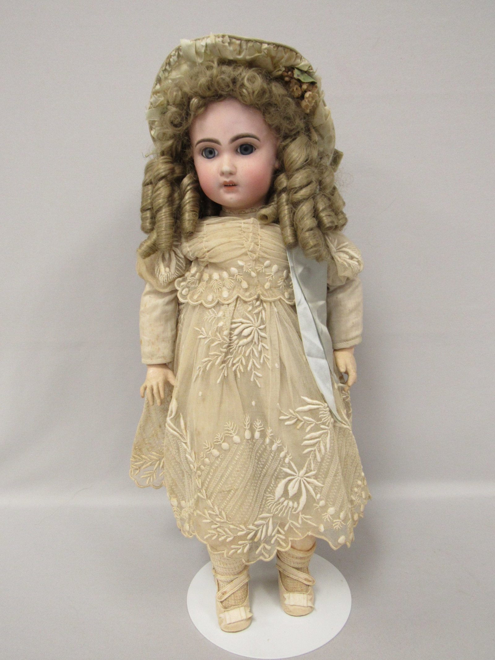 23 IN. BISQUE SWIVEL HEAD DOLL: (1 of 18)