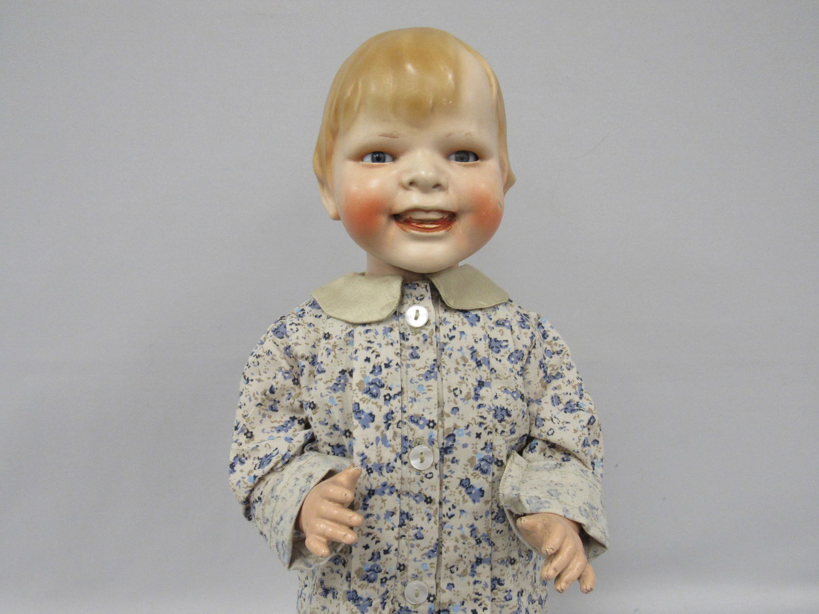 18 IN. GLADDIE. GEORGE BORGFELT CO.:: COMPO HEAD WITH SLEEP EYES, OPEN CLOSED MOUTH, CLOTH BODY COMPO LIMBS, CRACKING ON BOTH LEGS, EYEBROWS SHOW PARTIAL WEAR. SCUFF ON LEFT CHEEK - G