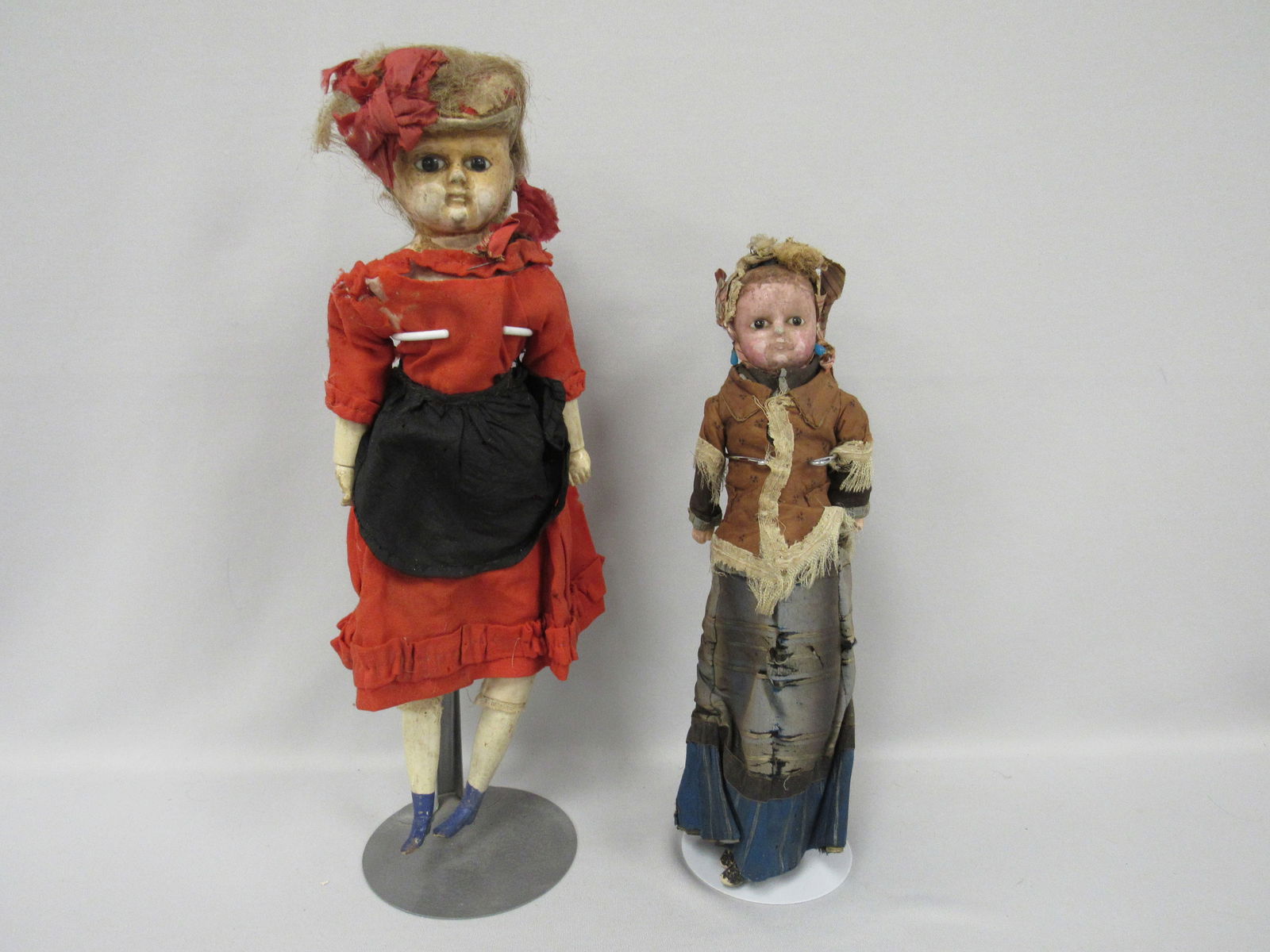 PAIR OF WAX OVER PAPER MACHE DOLLS: (1 of 18)