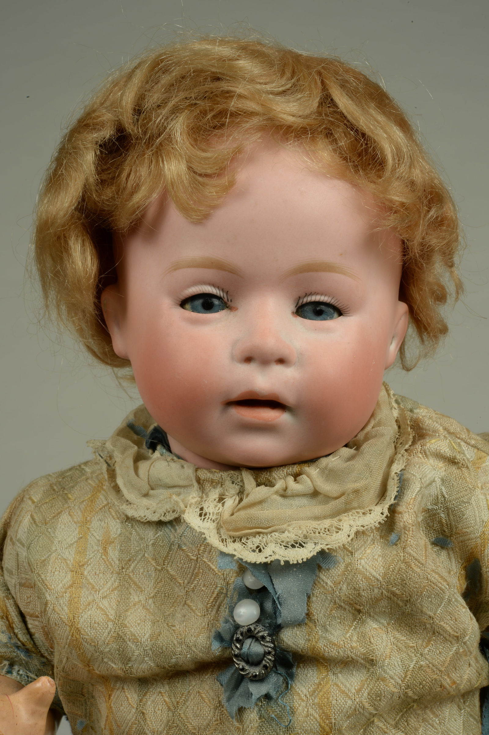 ADORABLE 15.5 IN. DIP CHARACTER TODDLER:: SWAINE & CO, GERMANY, 1910, FINE QUALITY BISQUE SOCKET HEAD INCISED DIP 5 WITH GREEN STAMP, MOLDED & PAINTED FEATURES WITH BLUE GLASS SLEEPING EYES, FULL BLUSHED CHEEKS, CLOSED POUTY MOUTH, ON HER