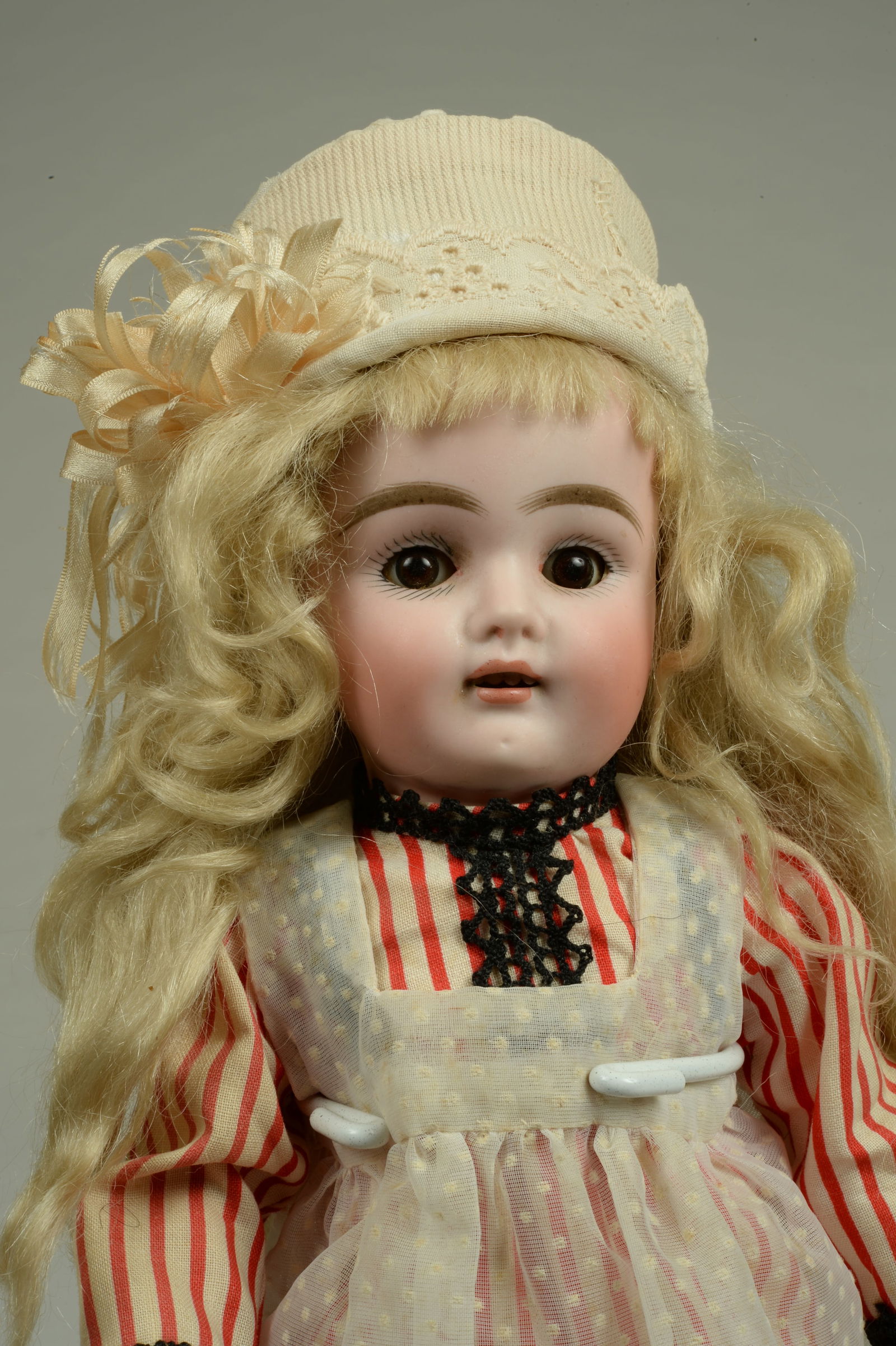 SWEET 11.5 IN. BAHR & PROSCHILD 281 CHILD:: BAHR & PROSCHILD, GERMANY, CIRCA 1900, FINE QUALITY BISQUE & HEAD INCISED 281 DEP WITH MOLDED & PAINTED FEATURES, BROWN GLASS SLEEPING EYES, BLUSHED CHEEKS, PIERCED EARS & AN OPEN MOUTH WITH 4 TEETH,