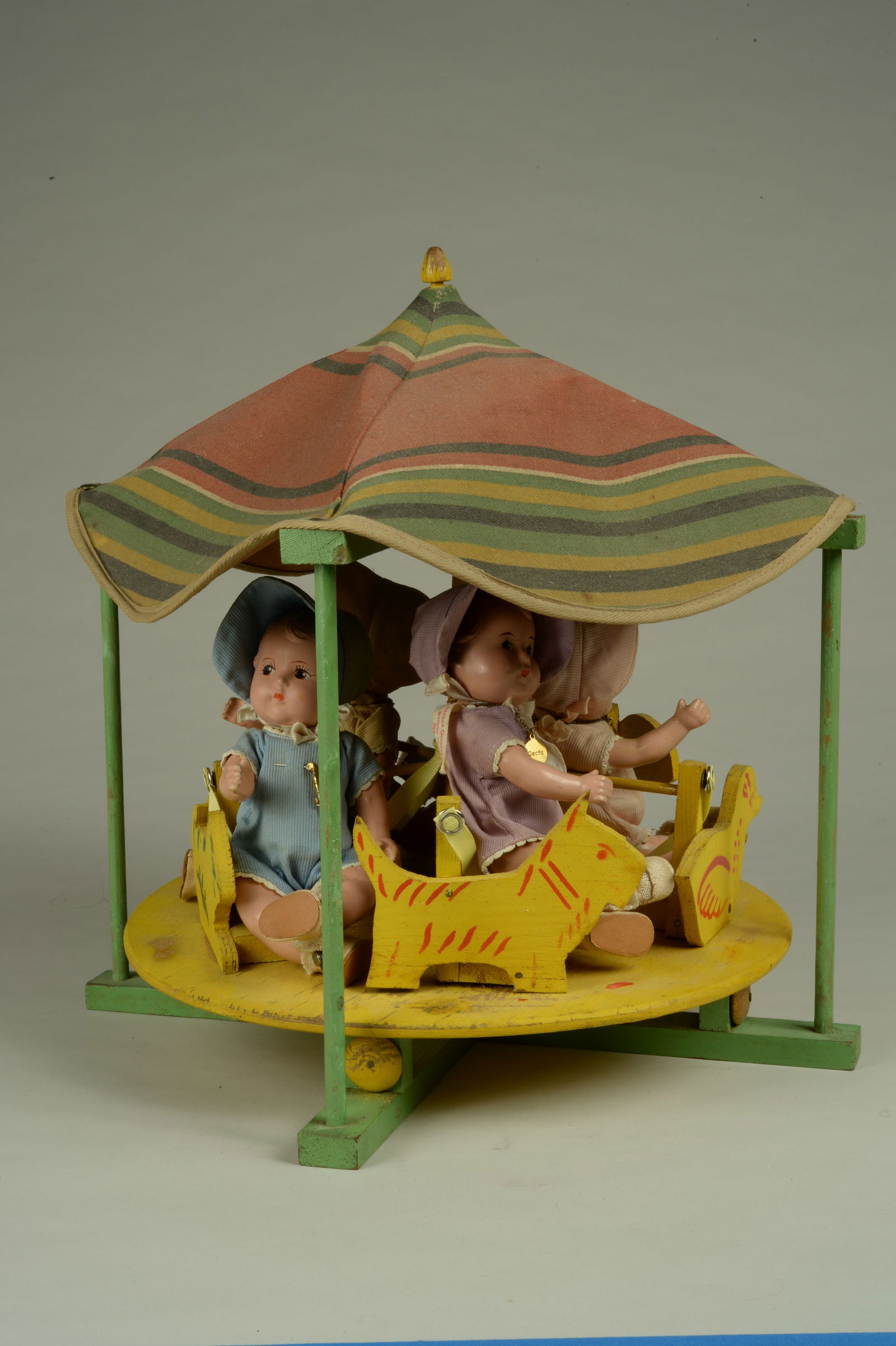 M. ALEXANDER DIONNE QUINTUPLETS IN CAROUSEL: (1 of 8)