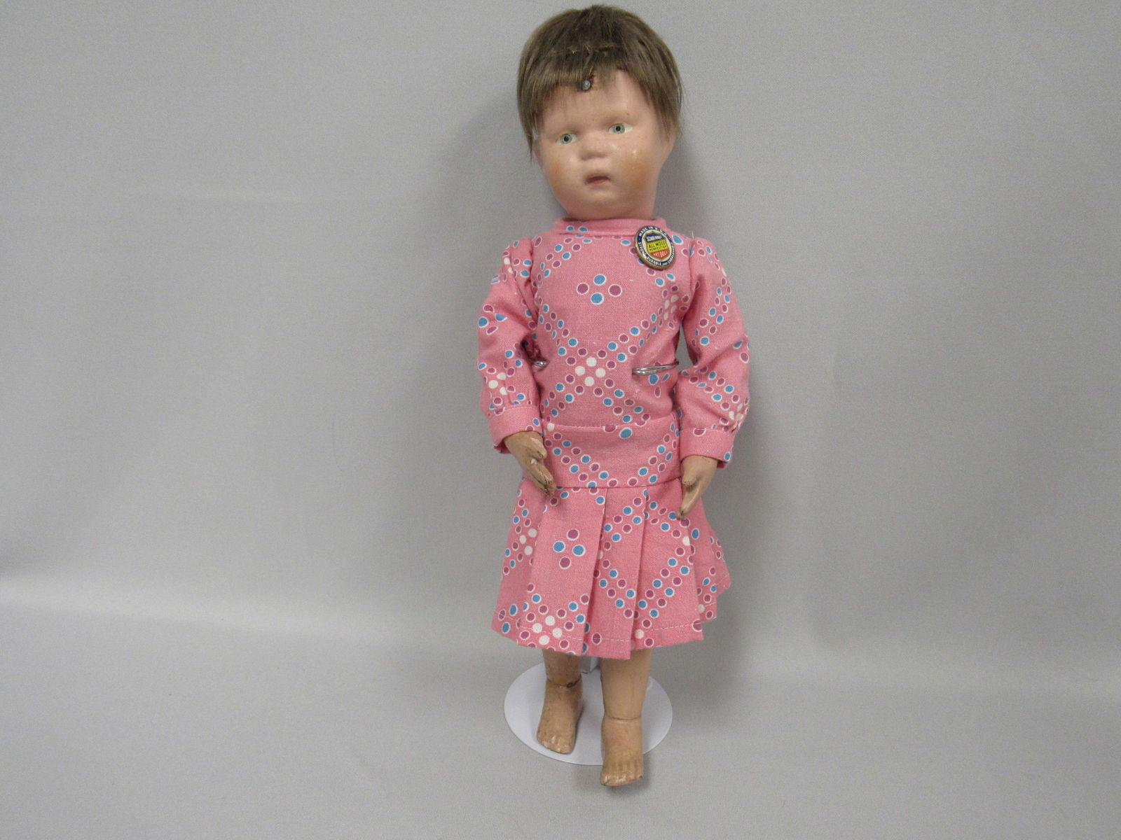 14.5 SCHOENHUT CHILD WALKER:: ARMS ARE STRAIGHT, WALKER LEGS, SCHOENHUT PIN FEET HAVE GLUE MARKS ON THE ANKLES. WIG IS ORIGINAL