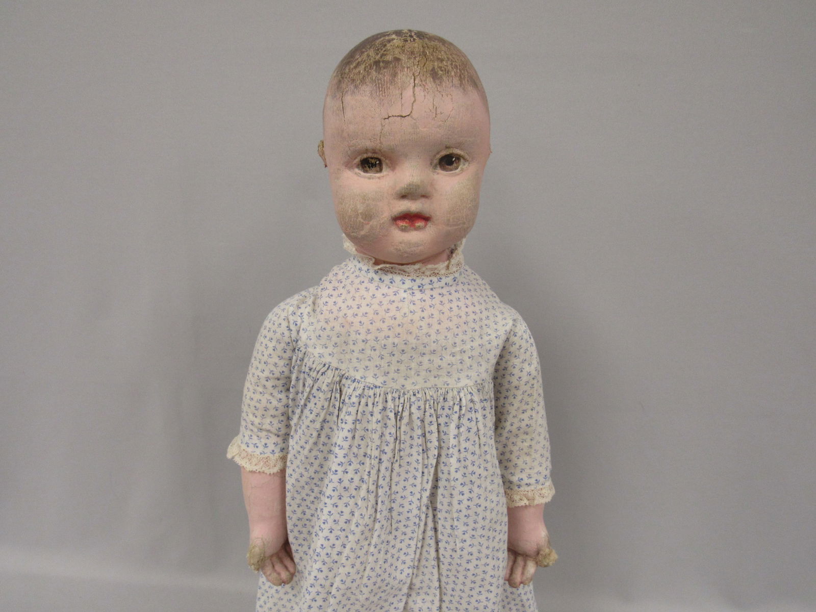 21 IN. CHASE CHILD:: STOCKINGETT PAINTED WITH OIL. TOUCHED UP WITH MUCH WEAR ON HEAD, HANDS (ESPECIALLY BOTH THUMBS) & FEET - G
