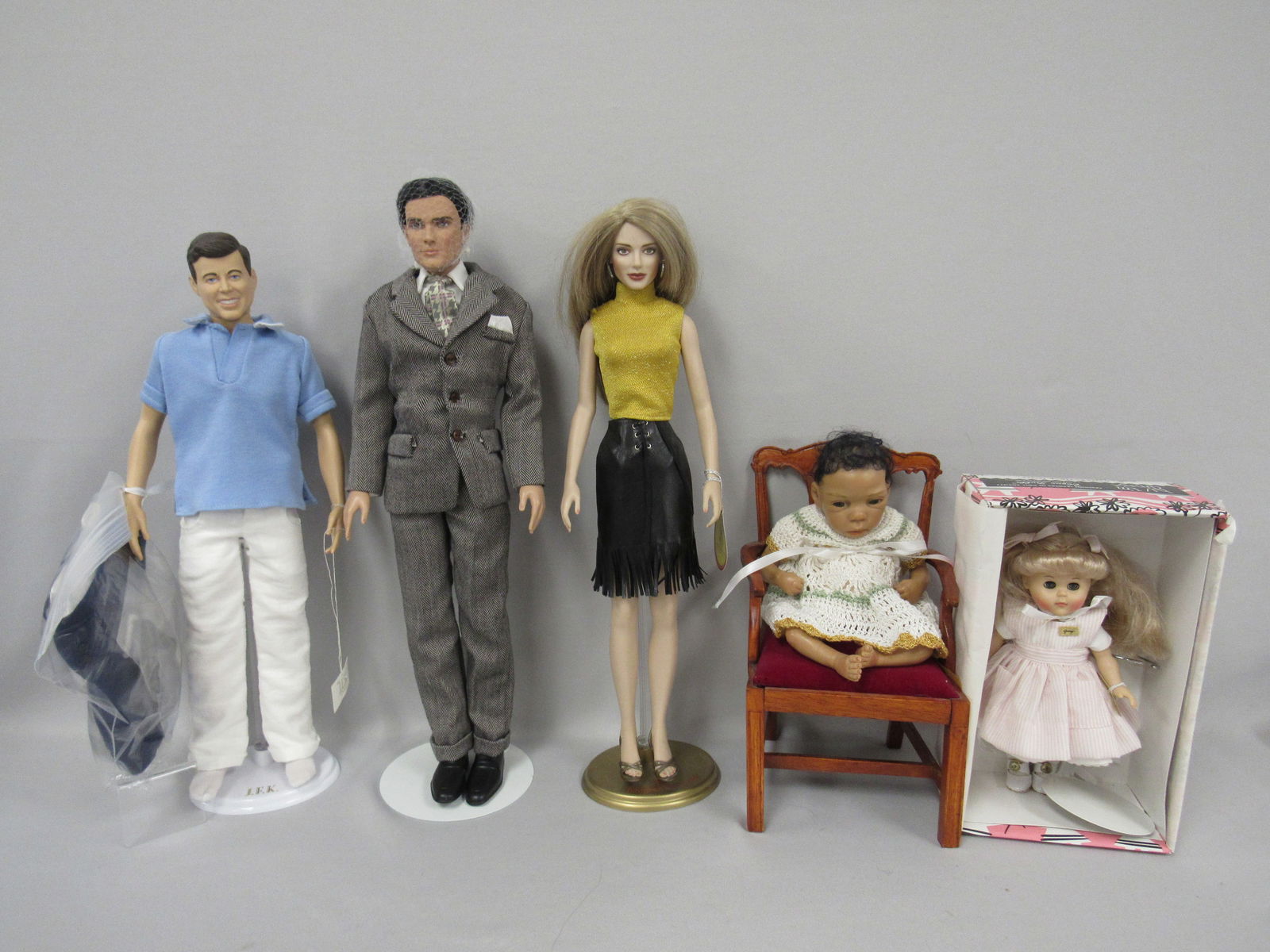 (5) MODERN COLLECTIBLE DOLLS:: VOGUE 8 IN. GERMANY "CANDY STRIPER" - N.MT./MT. WITH BOX, (3) VINYL INCLUDING F. MINT 16 IN. JENNIFER STALLONE & 16 IN. J.F. KENNEDY WITH HANDMADE SUIT & ACCESSORIES, PLUS 17 IN. TONNER "MATT