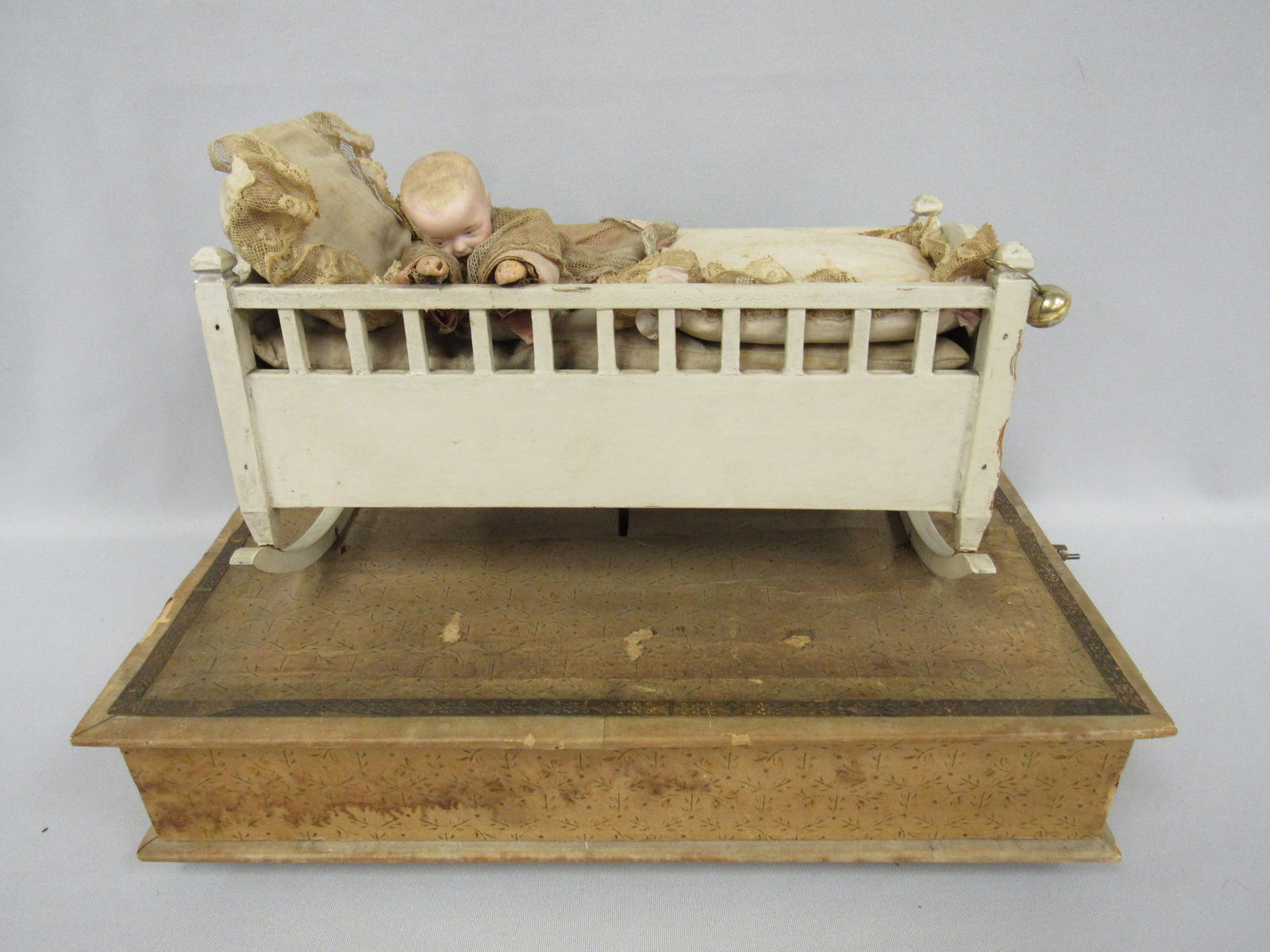 HAND-CRANKED AUTOMATON MUSIC BOX:: BABY ROCKING THE CRADLE WHEN CRANK IS TURNED. ONLY MUSIC PLAYS, NO ACTION - G