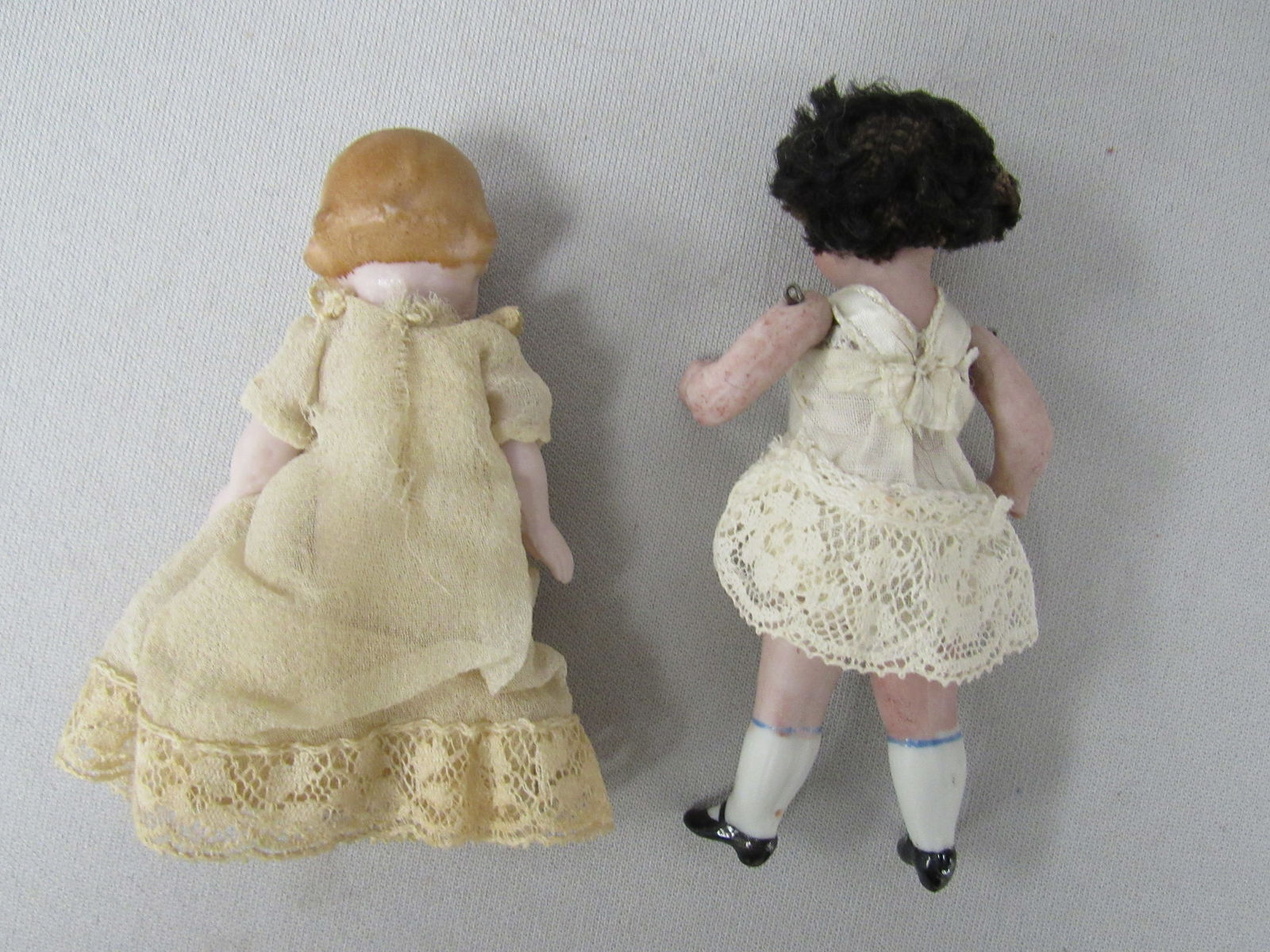 6 SMALL ALL BISQUE DOLLS: - 7
