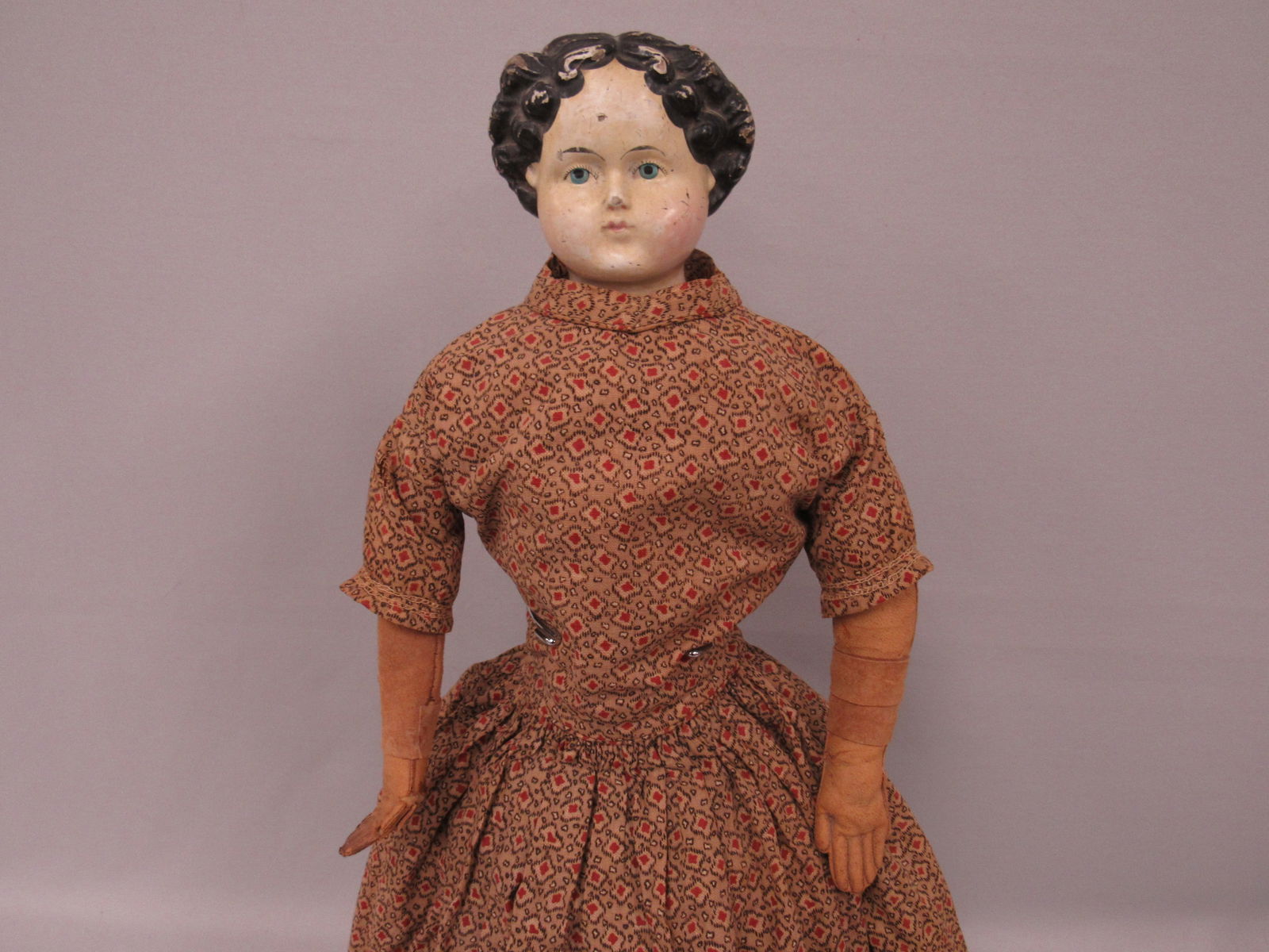 24 IN. GREINER PAPER MACHE SHOULDERPLATE:: MARKED WITH STICKER GREINER'S PATENT HEADS No. 7 PAT MARCH 30TH 58 PLATE IS CLEAN WITH SOME CRAZING, THERE ARE SCUFFS ON FACE, NOSE & HAIR. BODY IS CLOTH (STURDY) WITH LEATHER ARMS (REPAIRED) - G