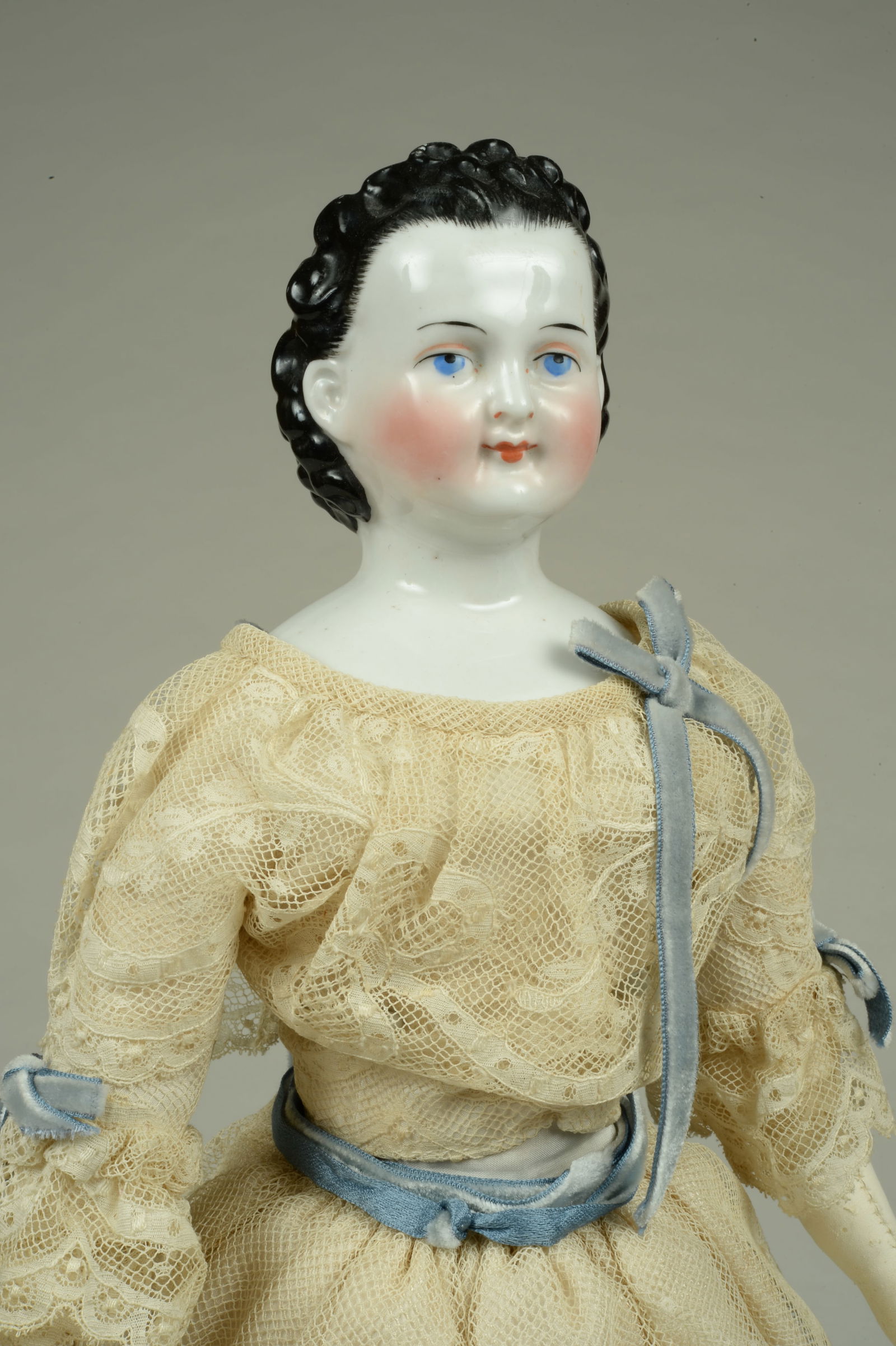 17.5 IN. CHINA DOLL WITH UNUSUAL HAIRSTYLE: (1 of 11)