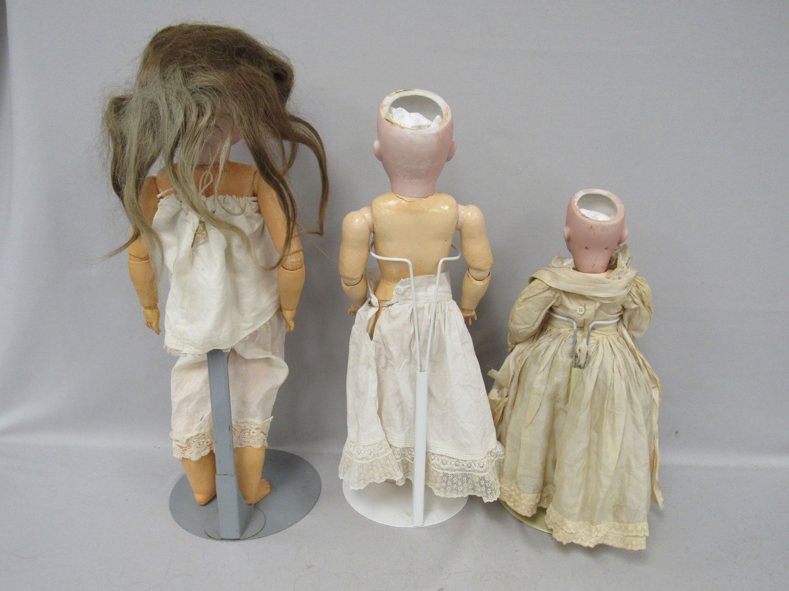 3 BISQUE HEAD DOLL GROUP: - 10