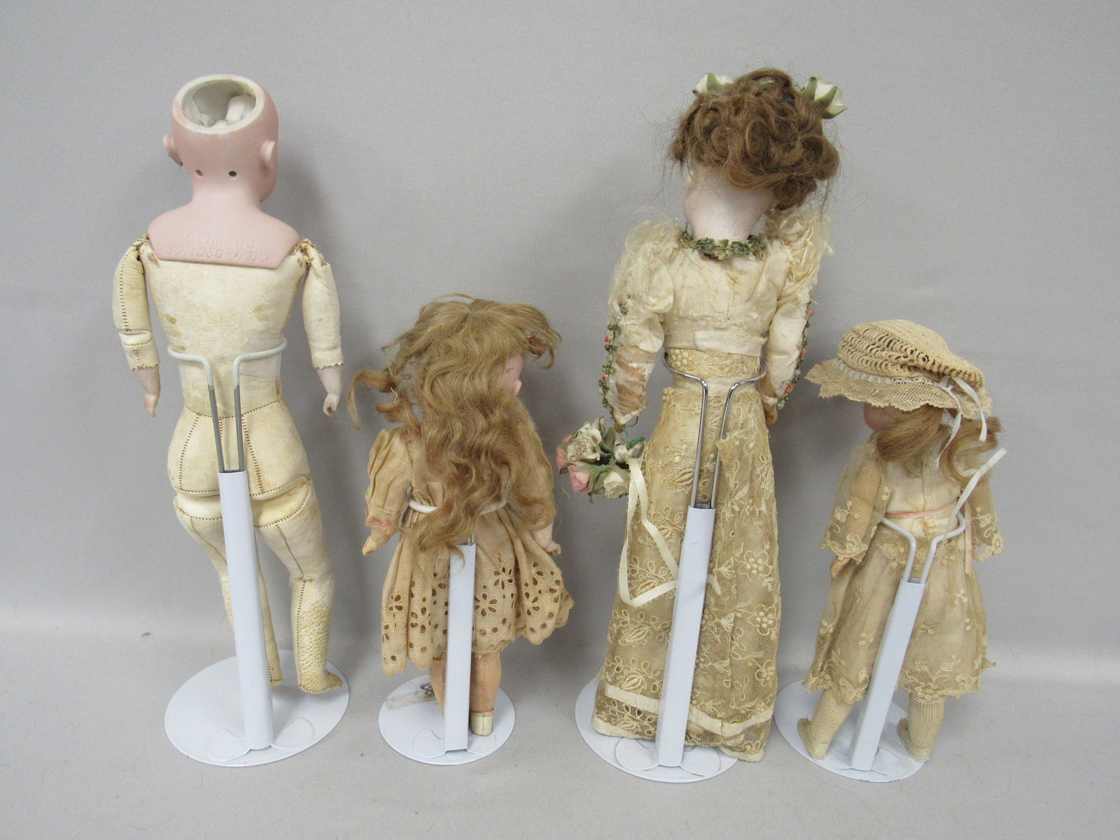 BISQUE HEAD DOLL GROUP: - 12