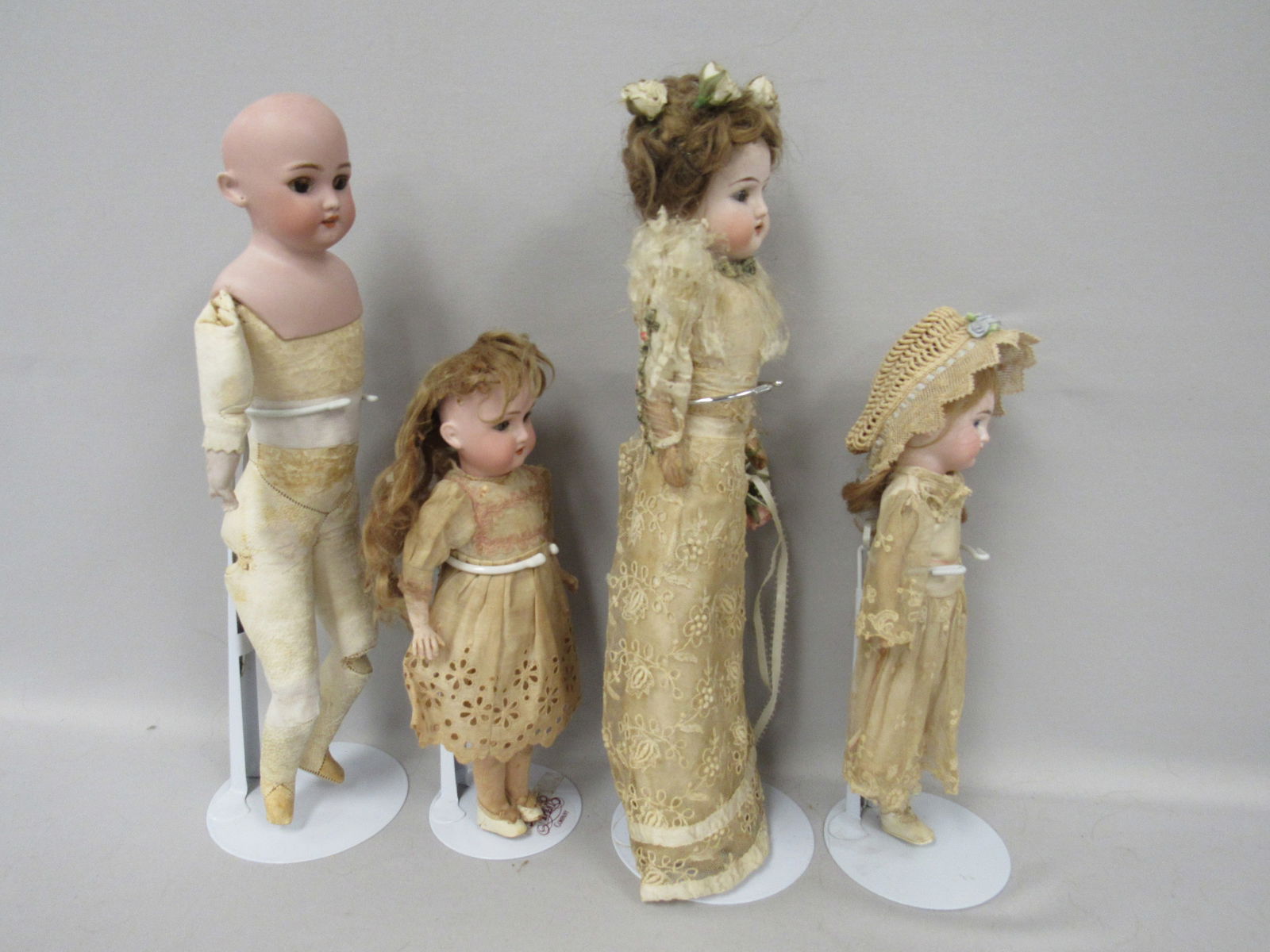 BISQUE HEAD DOLL GROUP: - 7