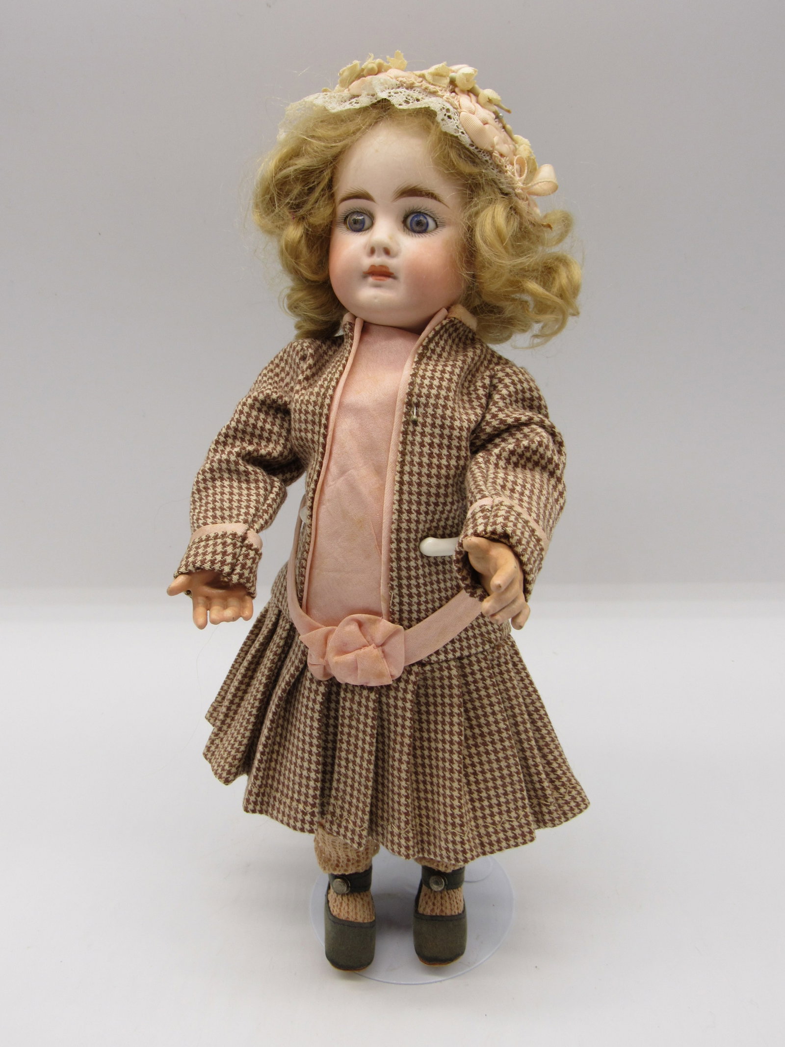 12 IN. BELTON BISQUE SOCKET HEAD CHILD:: PALE BISQUE HEAD, CLOSED MOUTH, STATIONARY PAPERWEIGHT EYES, ORIGINAL COMPO B.J. BODY, CALF OF RIGHT LEG SHOWS SOME WEAR & COMPO LOSS, PIERCED EARS, MOHAIR WIG IS ORIGINAL, GOOD BISQUE