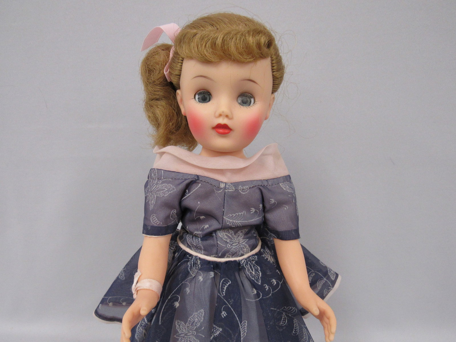 15 IN. MARKED IDEAL MISS REVLON DOLL:: WITH RARE SIDE PONYTAIL & BANGS. DRESSED IN LIKELY OU/O CLOTHES, VERY NICE COLORING - ALL ORIGINAL