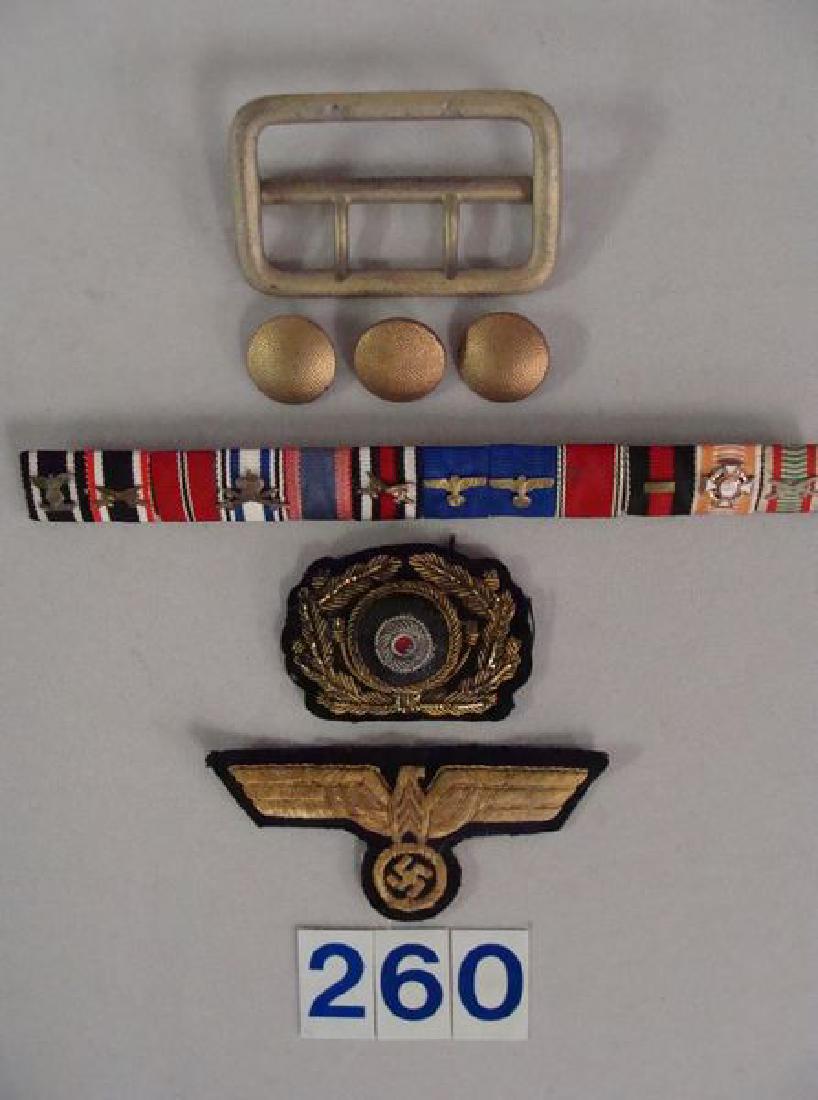 RARE GERMAN GENERALS INSIGNIA LOT: INCLUDING GOLD GILTED FINISH BELT BUCKLE, RARE CELLULOID BREAST EAGLE, BEAUTIFUL 12 PLACE RIBBON BAR, GOLD BULLION VISOR CAP WREATH WITH THREE GOLD GILDED TUNIC BUTTONS