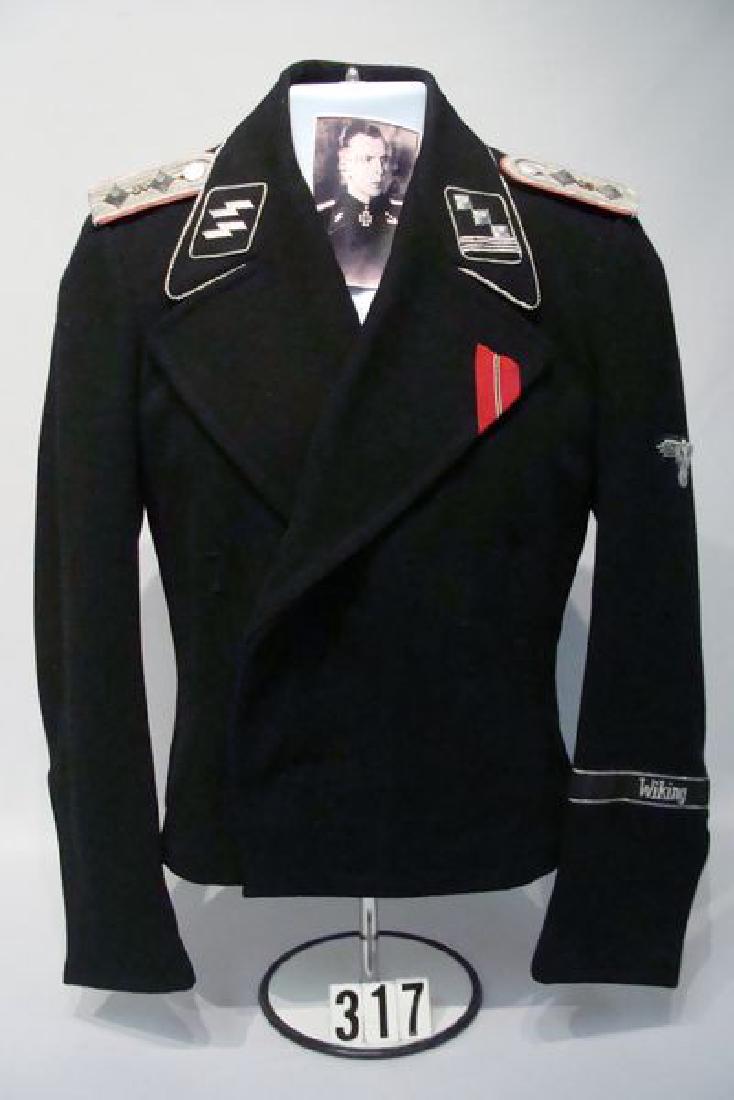 RARE GERMAN WAFFEN SS FIELD USE PANZER: WRAPPER ATTAINED FROM THE FAMILY OF SS HAUPSTRUMFUHRER 'HANS FLUGLE' OF THE FAMOUS 5TH SS PANZER DIVISION 'WIKING', THIS JACKET HAS SEEN COMBAT & SOME MODIFICATION BUT IS INTACT & VERY RARE, HAS LOOPS