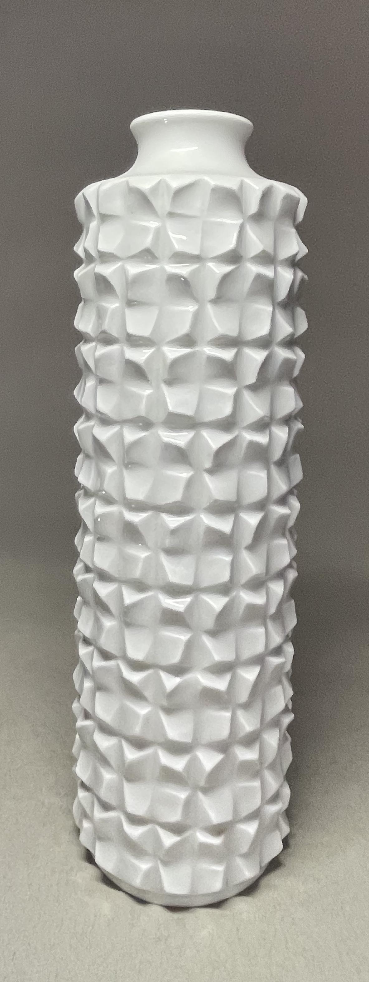 A Meissen porcelain vase, designed by Ludwig Zepner - Mid Century Modern: Marked with blue crossed swords and incised with two crossed swords, A beautiful vase that juxtaposes its elegant simplicity with a raw and intentionally coarse exterior.