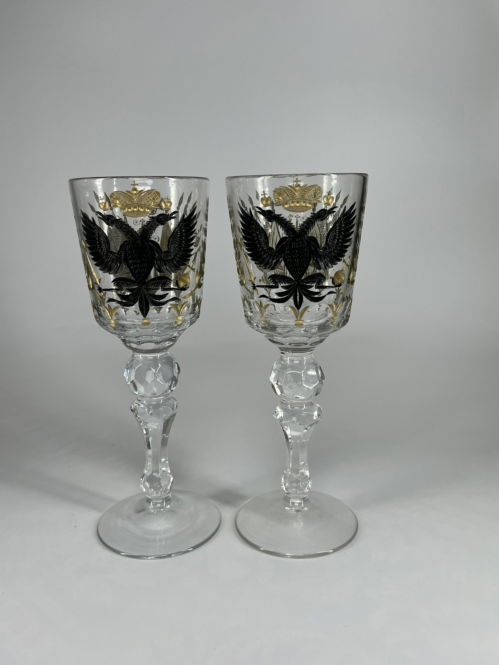 A pair of very fine Russian carved crystal chalices for the Imperial court of Emperor Nicholas II: 9.4" tall. Manufacturer St. Petersburg Imperial Glass Factory, circa 1913 A pair of very fine Russian wine crystal chalices, from the the Romanov Tercentenary service, Imperial Glass factory,In 18th c
