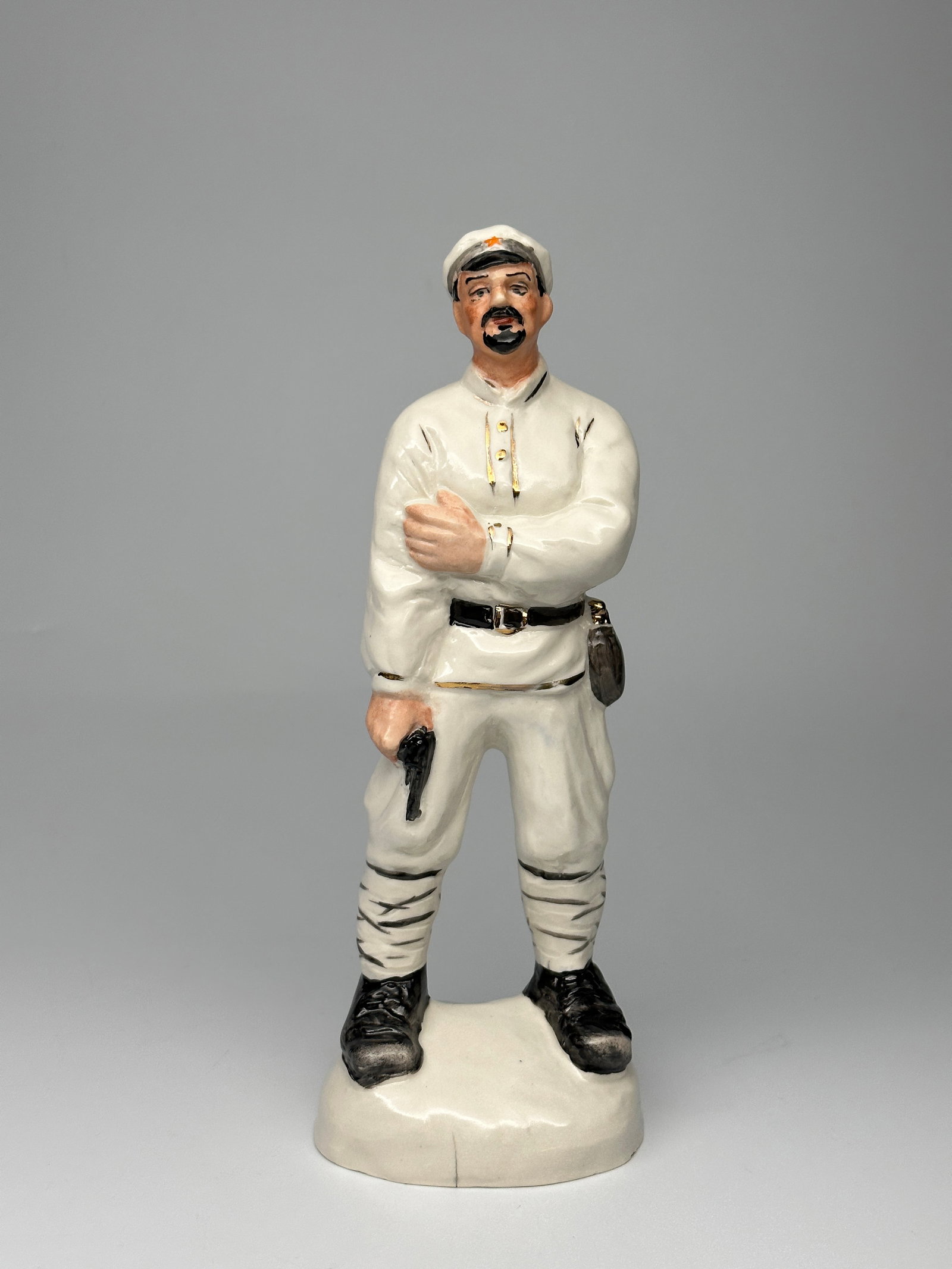 Extremely Rare USSR Porcelain Figurine of a Soviet Movie Classic "White Sun of the Desert": This exemplary Soviet porcelain figurine was based on the protagonist of the Classic Soviet Ostern film "White Sun of the Desert " filmed in 1970. The figure depicts the Red Army soldier Fyodor Sukhov