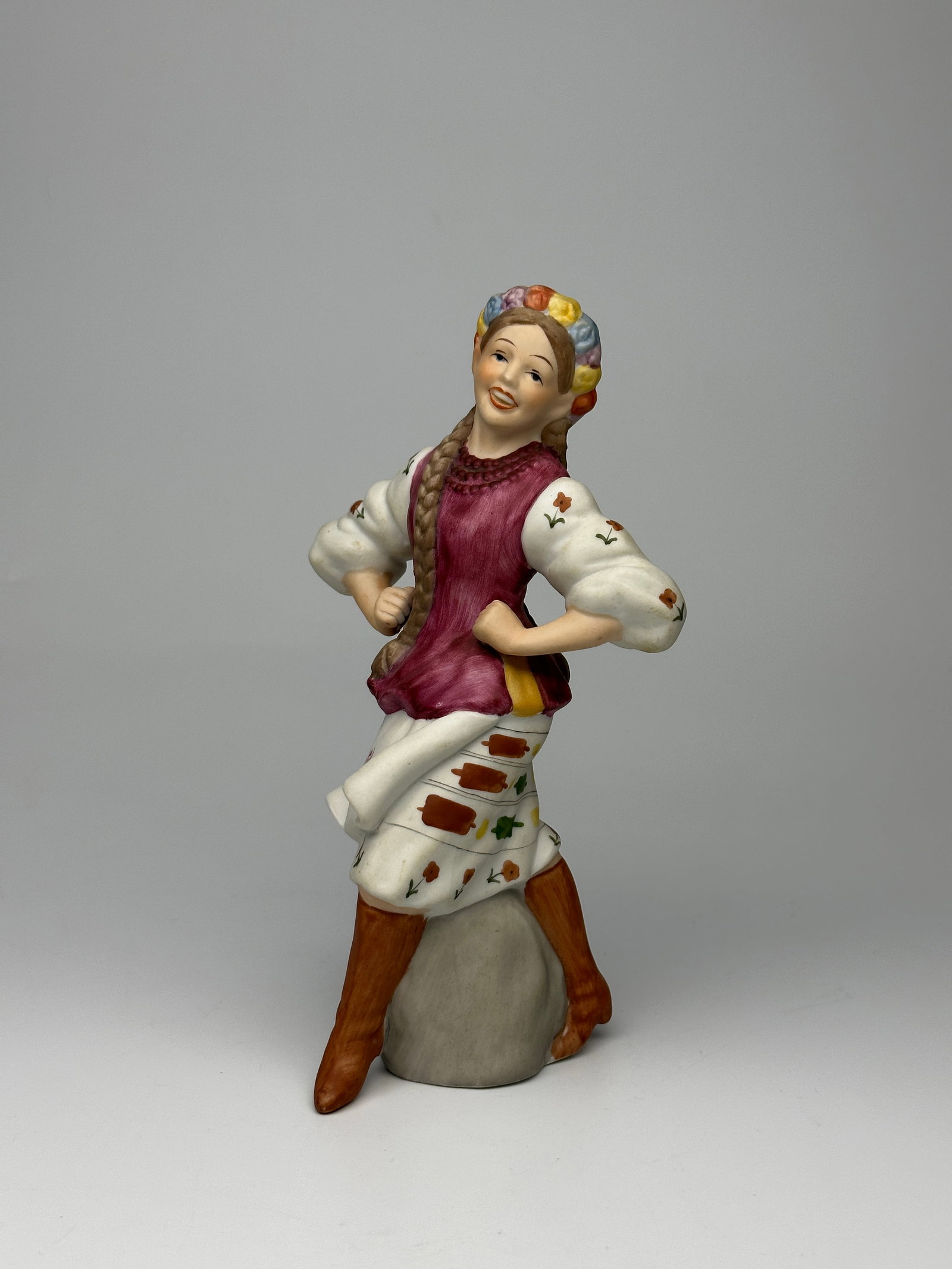 Figurine of a Dancing Ukrainian girl.: Figurine of a Dancing Ukrainian girl. Petrushs Ukrainian Arts. Unglazed porcelain. Height: 7.5 inches