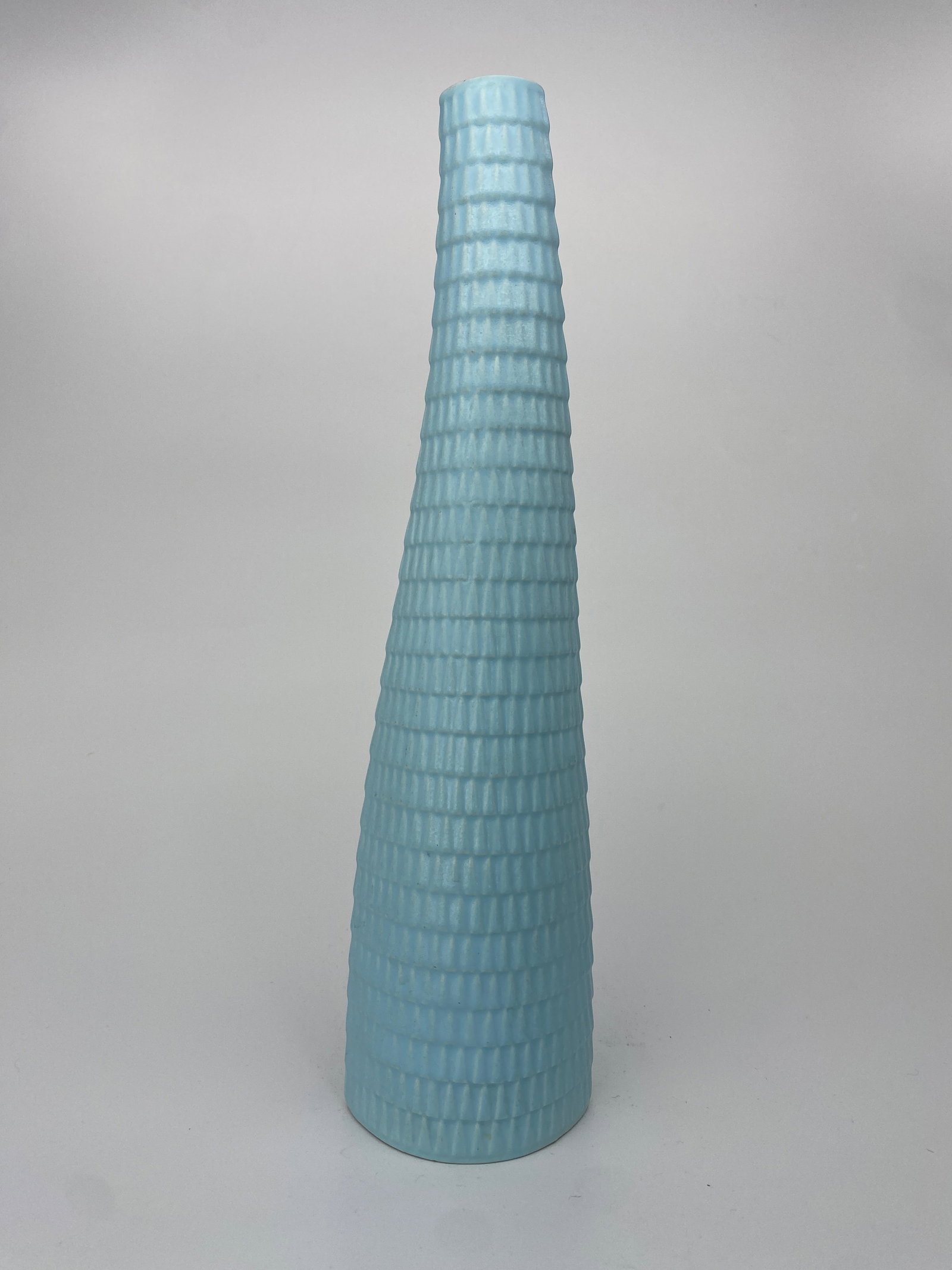 Stig Lindberg - Gustavsberg "Reptil" vase with matte blue glaze, 1950s-60s: Tall "Reptil" vase with pale blue glaze circa 1950s-60s. Stig Lindbergs "Reptil” vases belong to a series produced from the 1950s onward. Lindberg frequently reinterpreted natural occurrences wi