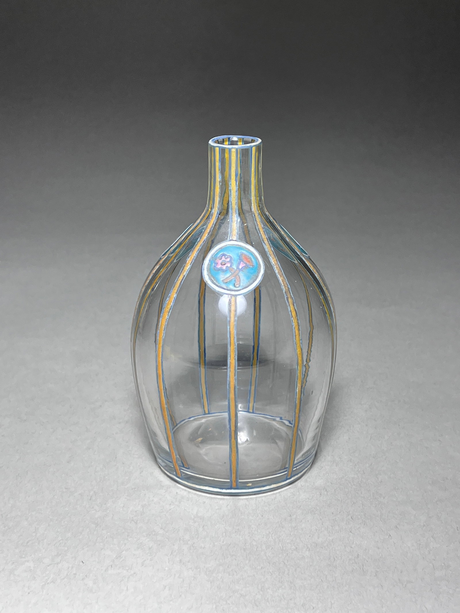 Maurice Marinot (1882-1960) - Glass and Enamel Stripped Bottle - c. 1911-1919: Fine quality early glass bottle by French glass master and painter Maurice Marinot, with enameled stripes along the body and three flower motifs on three enamel blue ground circles spaced equally apar