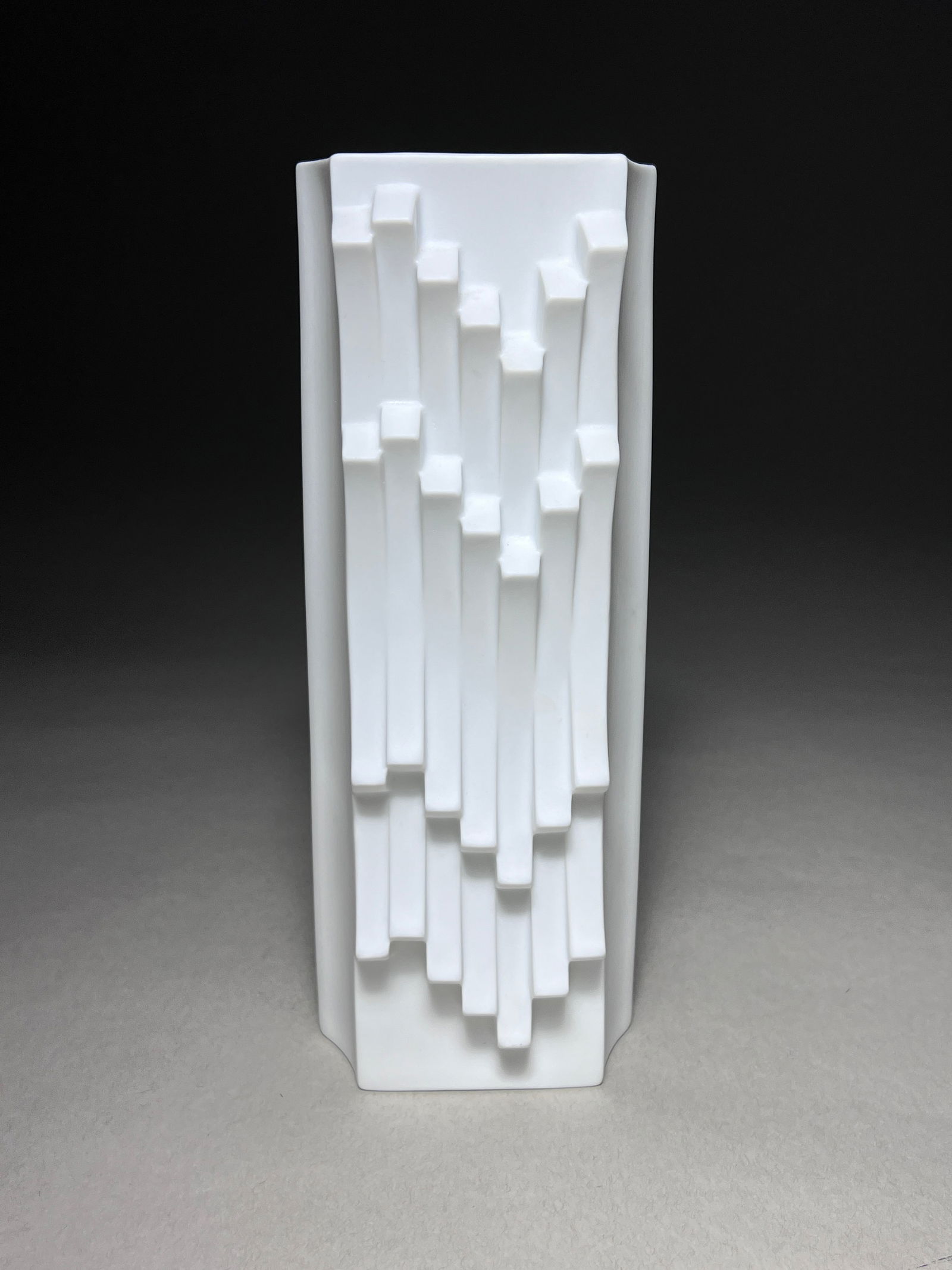 Modernist "Archais" Porcelain Vase by Heinrich Fuchs for Lorenz Hutschenreuther - circa 1960s: German vase with matte white glaze, Hutschenreuther lion mark and engraved Fuchs on base. The design of the lion mark indicates the date of production was in the late 60s or early 70s. Beautiful white