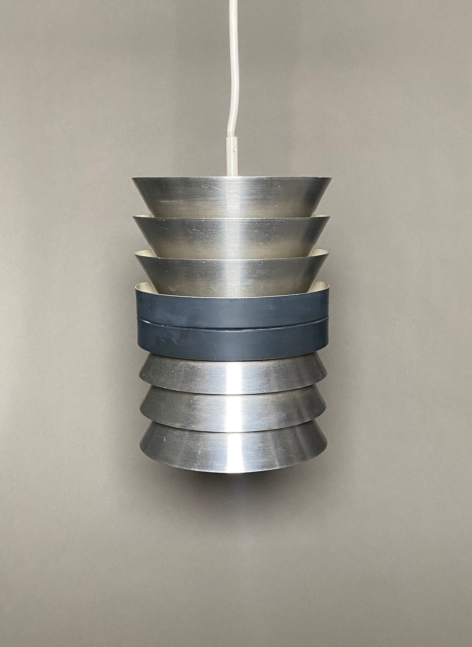 Doria Leuchten Chandelier with black ring 1960s Germany: 1960s Doria Leuchten ceiling lamp made out of layered brushed aluminum. With black ring, mid 20th century design, Carl Thore style. Doria Leuchten, Germany, 1960s The item was examined under UV blackl