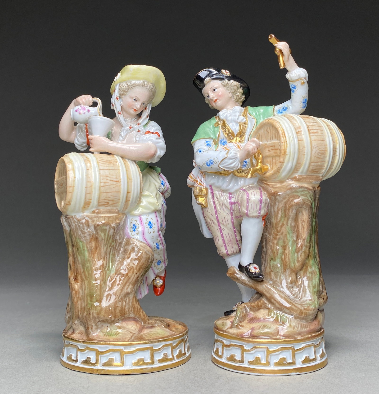 Pair Meissen Porcelain Figures 'Vintners & Companion', 19th Century: Pair Meissen Porcelain Figures 'Vintners & Companion', 19th Century A fine pair of 19th-century Meissen porcelain figures, modeled after Michel Victor Acier and inspired by a drawing by Johan Schenau,