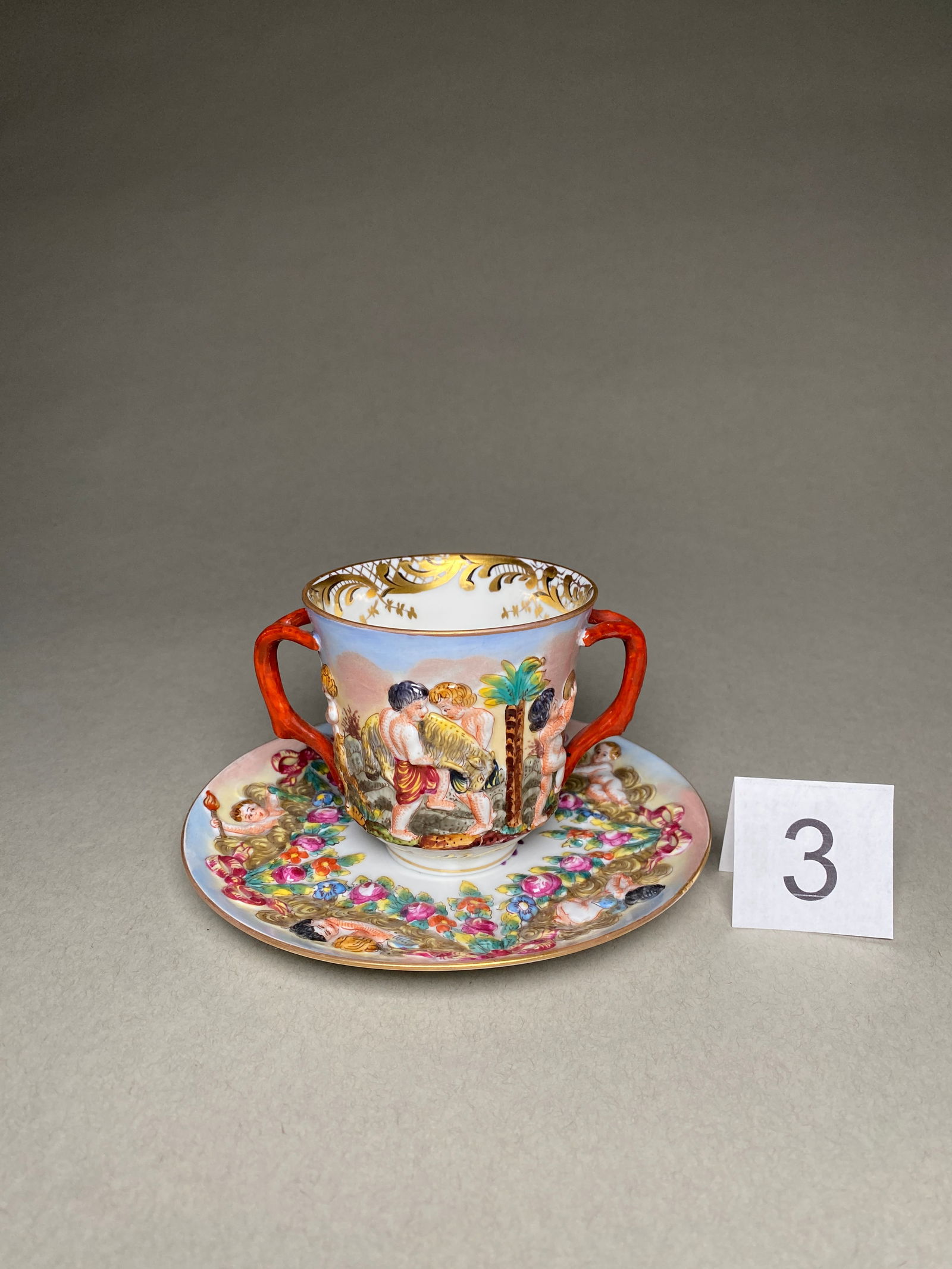 Late 19th Century Capodimonte Porcelain Chocolate Cup, Saucer: Late 19th Century Capodimonte Porcelain Chocolate Cup, Saucer This porcelain chocolate cup, saucer was produced in Italy by Capodimonte in the late 19th century. The cup and saucer are marked with the