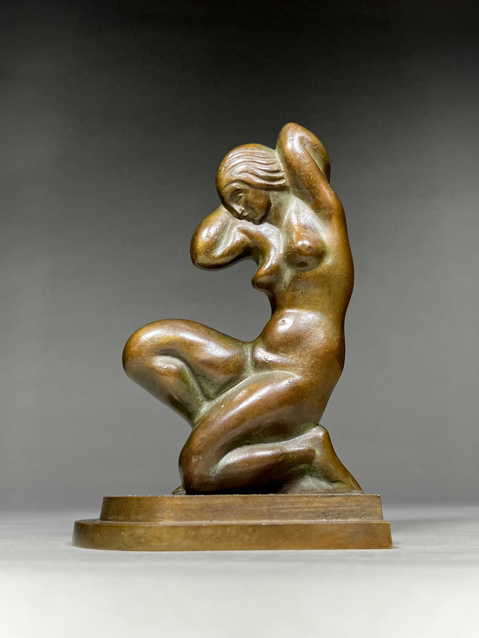Danish Art Deco Bronze Female Nude Sculpture by Tinos - c.1930s: Danish Art Deco Bronze Female Nude Sculpture by Tinos - c.1930s Scandinavian Art Deco bronze featuring a female nude in a graceful contemplative pose. The figure is depicted with flowing hair and smoo